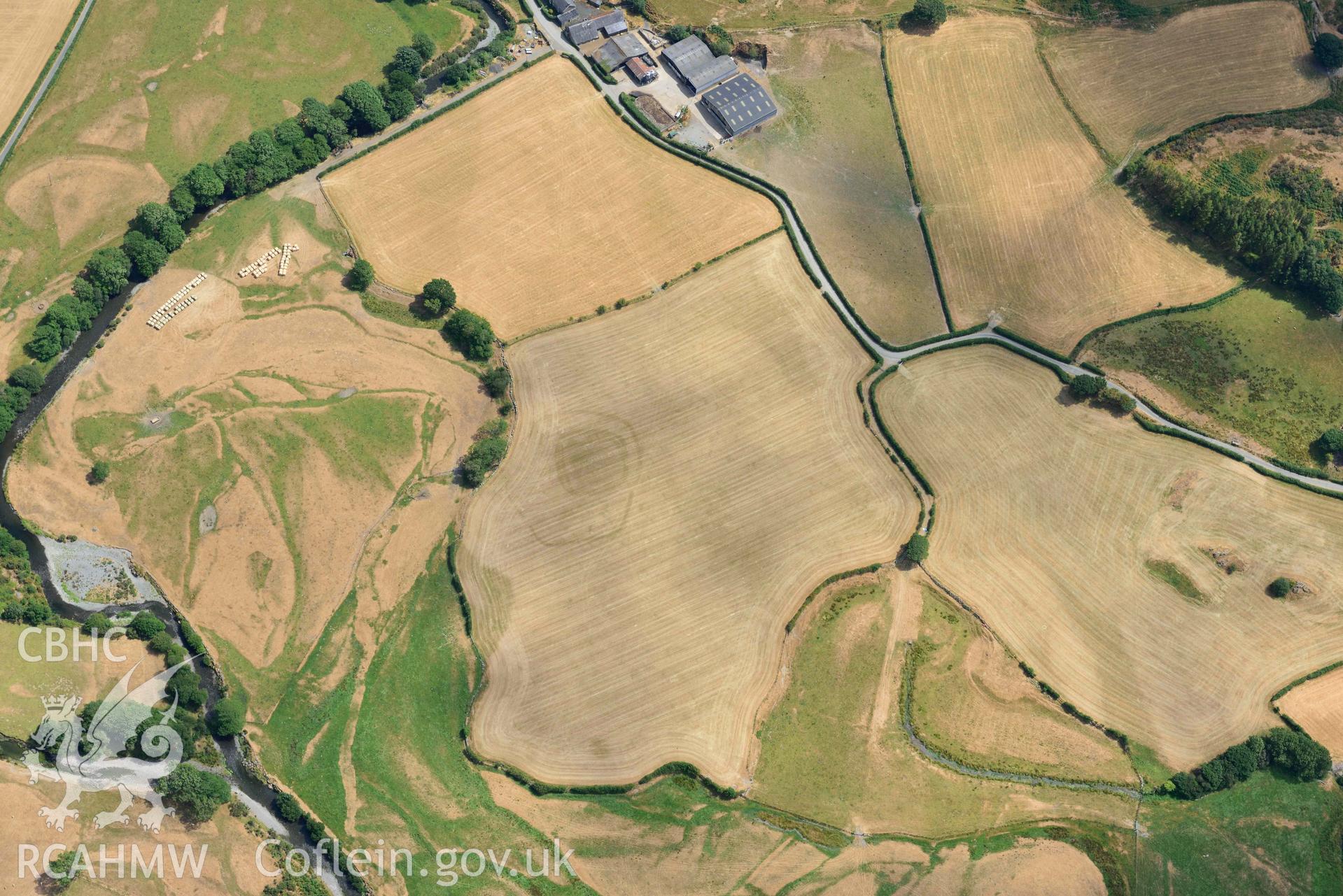 Detailed view of Dyffryn Dysynni defended enclosure. Oblique aerial photograph taken during the Royal Commission’s programme of archaeological aerial reconnaissance by Toby Driver on 10 July 2018.