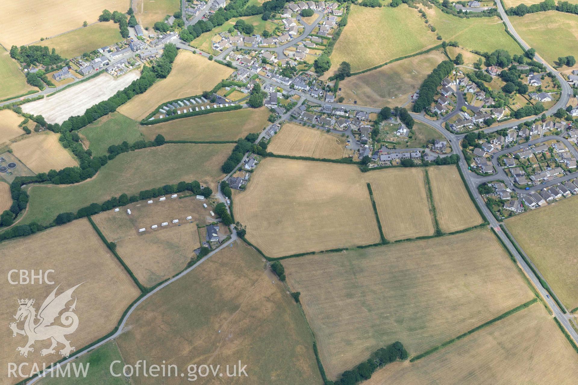 General view of Bryncrug Pont y Felindre cropmarks. Oblique aerial photograph taken during the Royal Commission’s programme of archaeological aerial reconnaissance by Toby Driver on 10 July 2018.