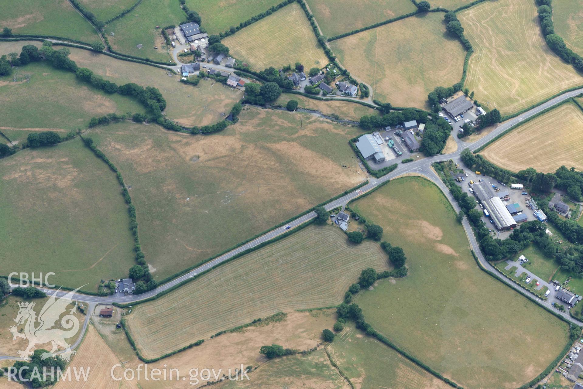 Bryncrug Pont y Felindre cropmarks. Oblique aerial photograph taken during the Royal Commission’s programme of archaeological aerial reconnaissance by Toby Driver on 10 July 2018.