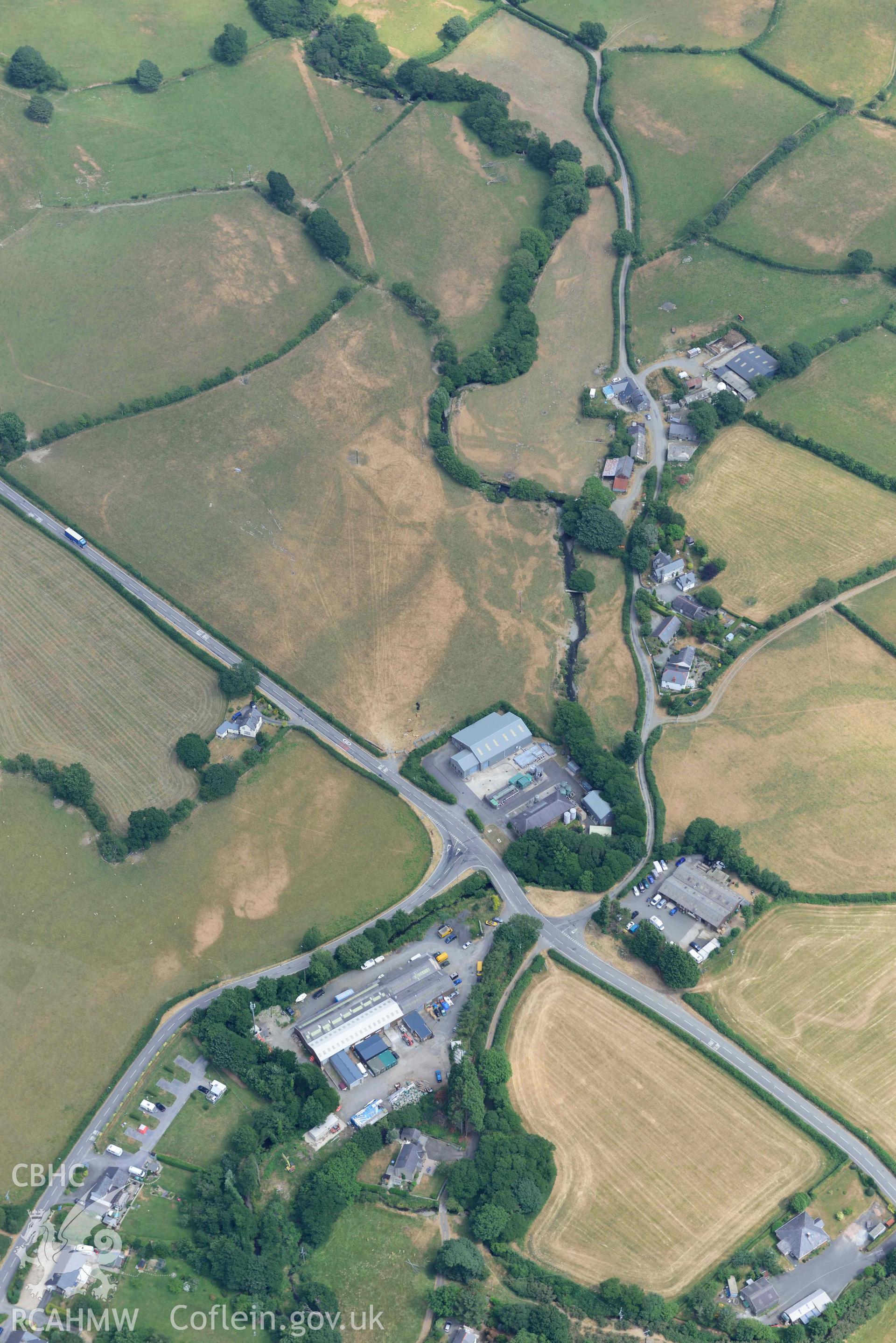 Bryncrug Pont y Felindre cropmarks. Oblique aerial photograph taken during the Royal Commission’s programme of archaeological aerial reconnaissance by Toby Driver on 10 July 2018.