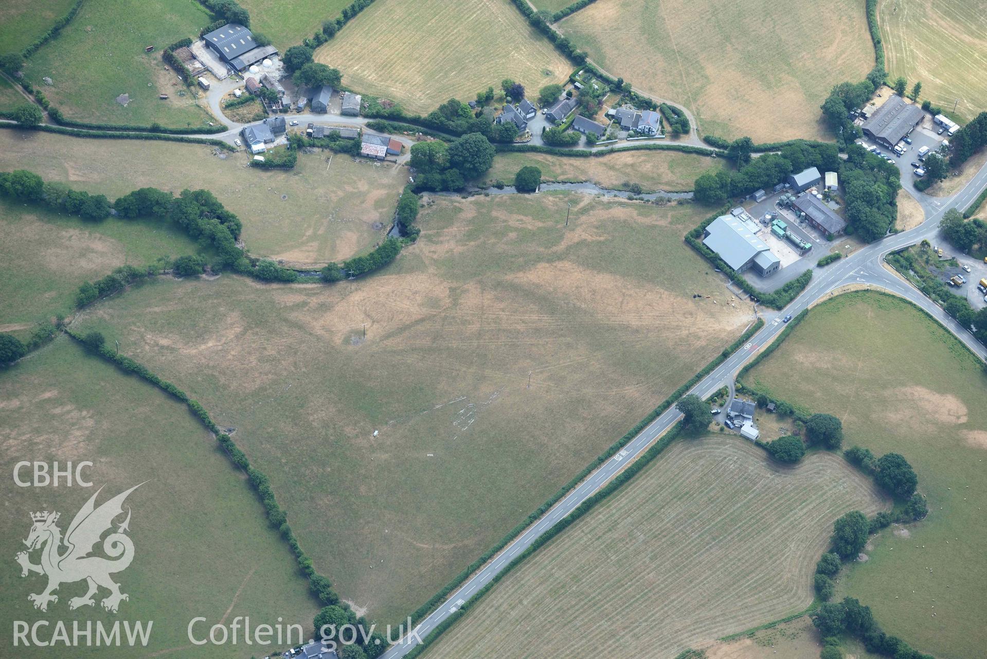 Bryncrug Pont y Felindre cropmarks. Oblique aerial photograph taken during the Royal Commission’s programme of archaeological aerial reconnaissance by Toby Driver on 10 July 2018.