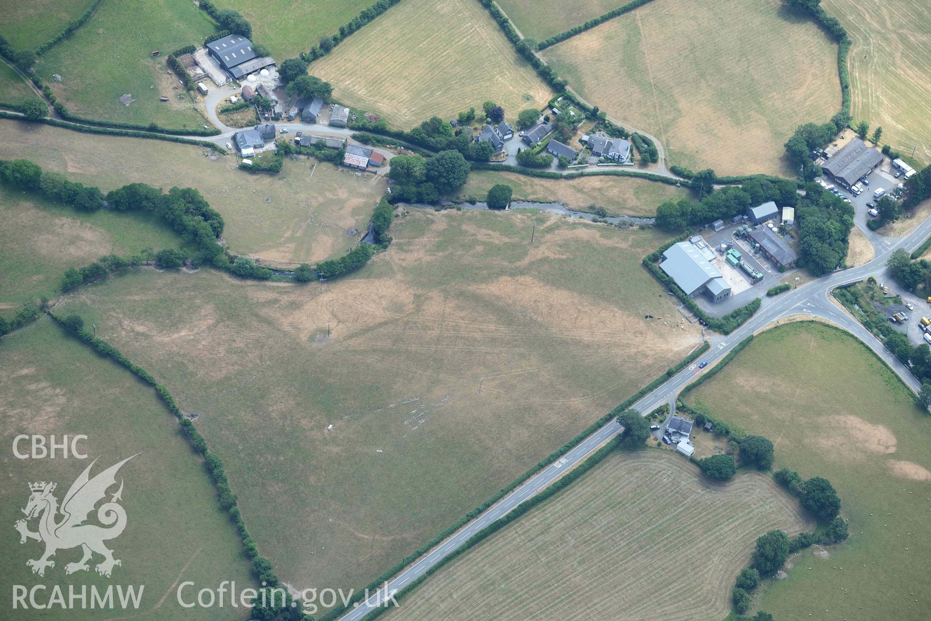 Bryncrug Pont y Felindre cropmarks. Oblique aerial photograph taken during the Royal Commission’s programme of archaeological aerial reconnaissance by Toby Driver on 10 July 2018.