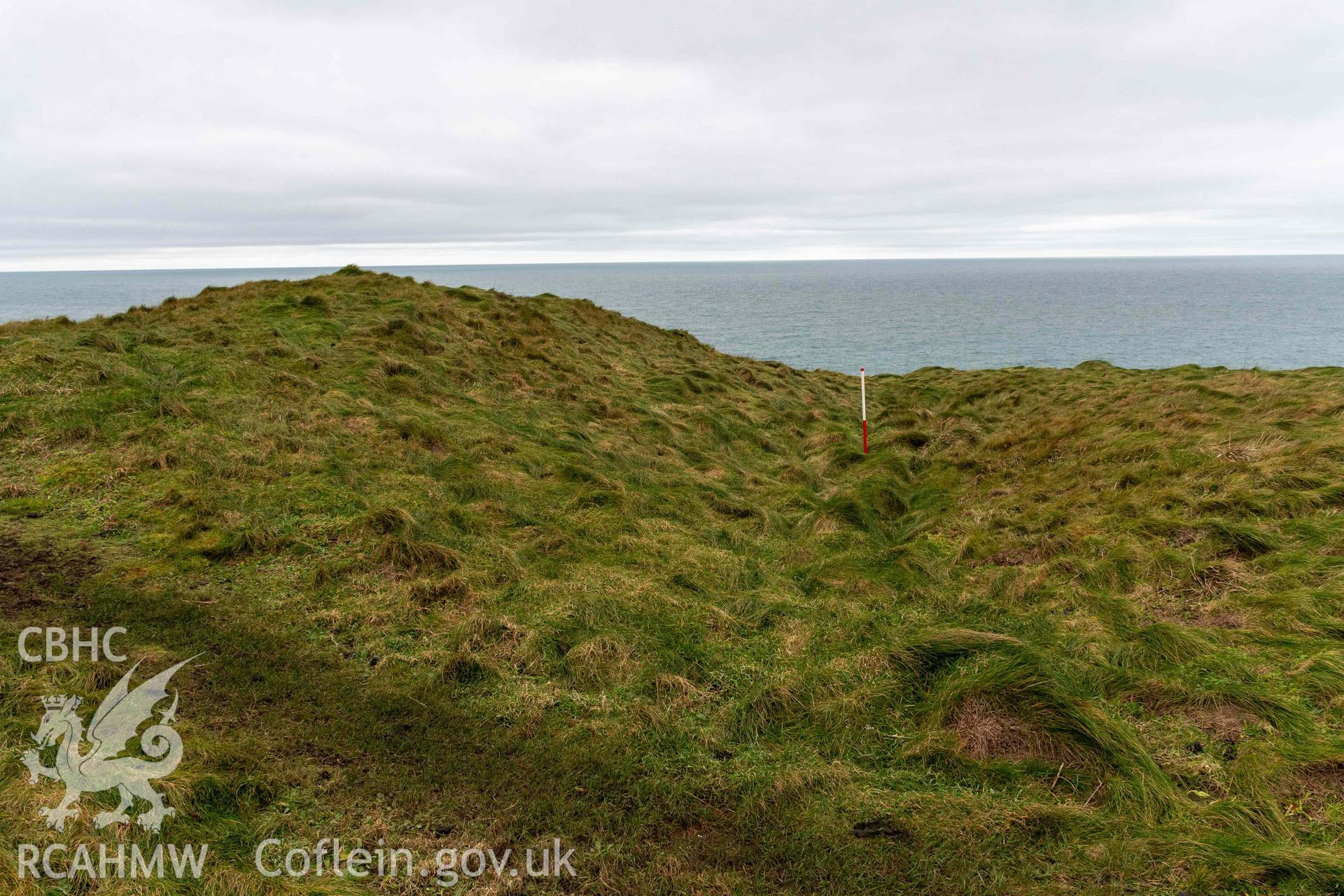 Castell Coch Promontory Fort. Second (middle) bank and ditch, looking north (with scale).