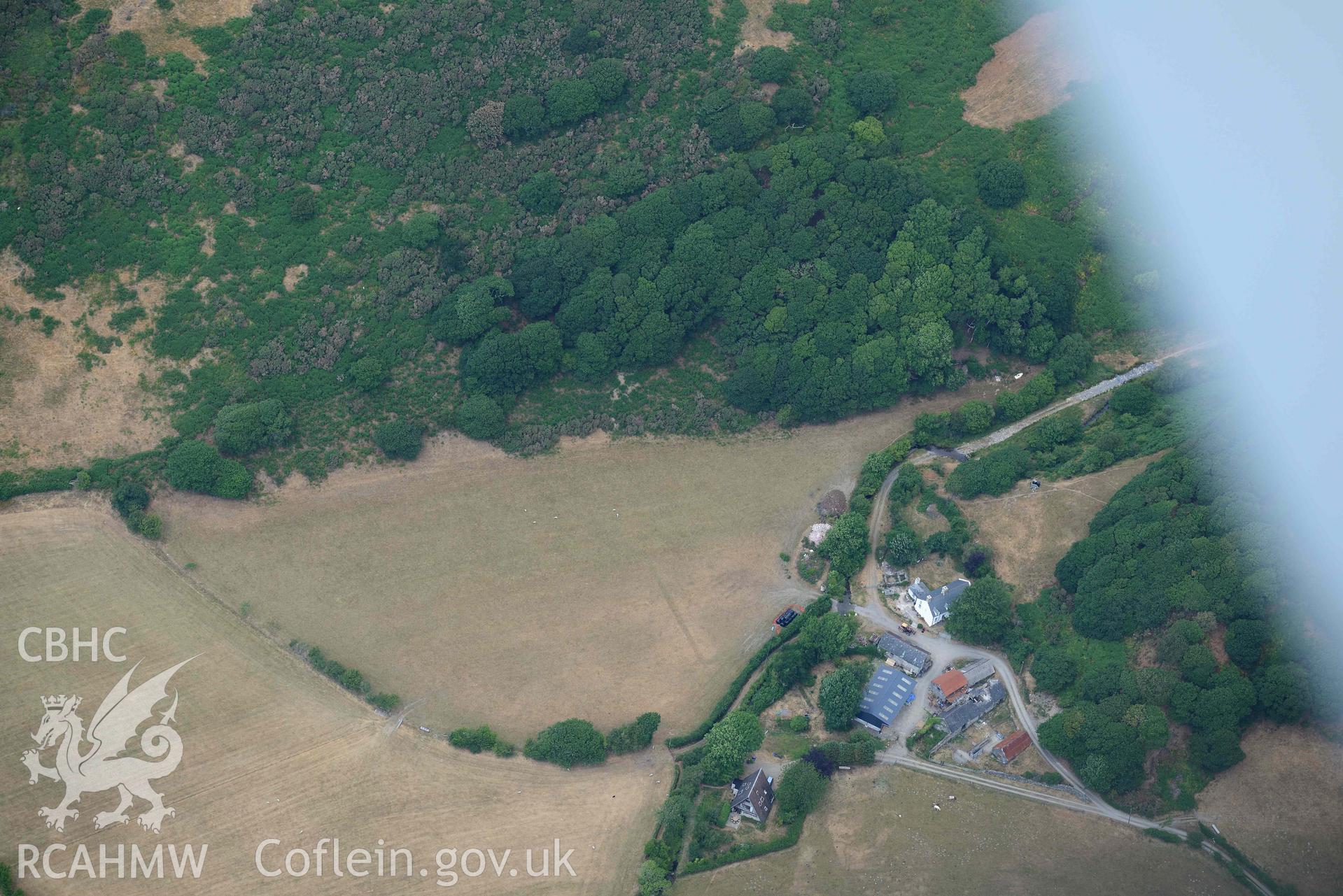 Bryn Dinas rectangular enclosure. Oblique aerial photograph taken during the Royal Commission’s programme of archaeological aerial reconnaissance by Toby Driver on 10 July 2018.