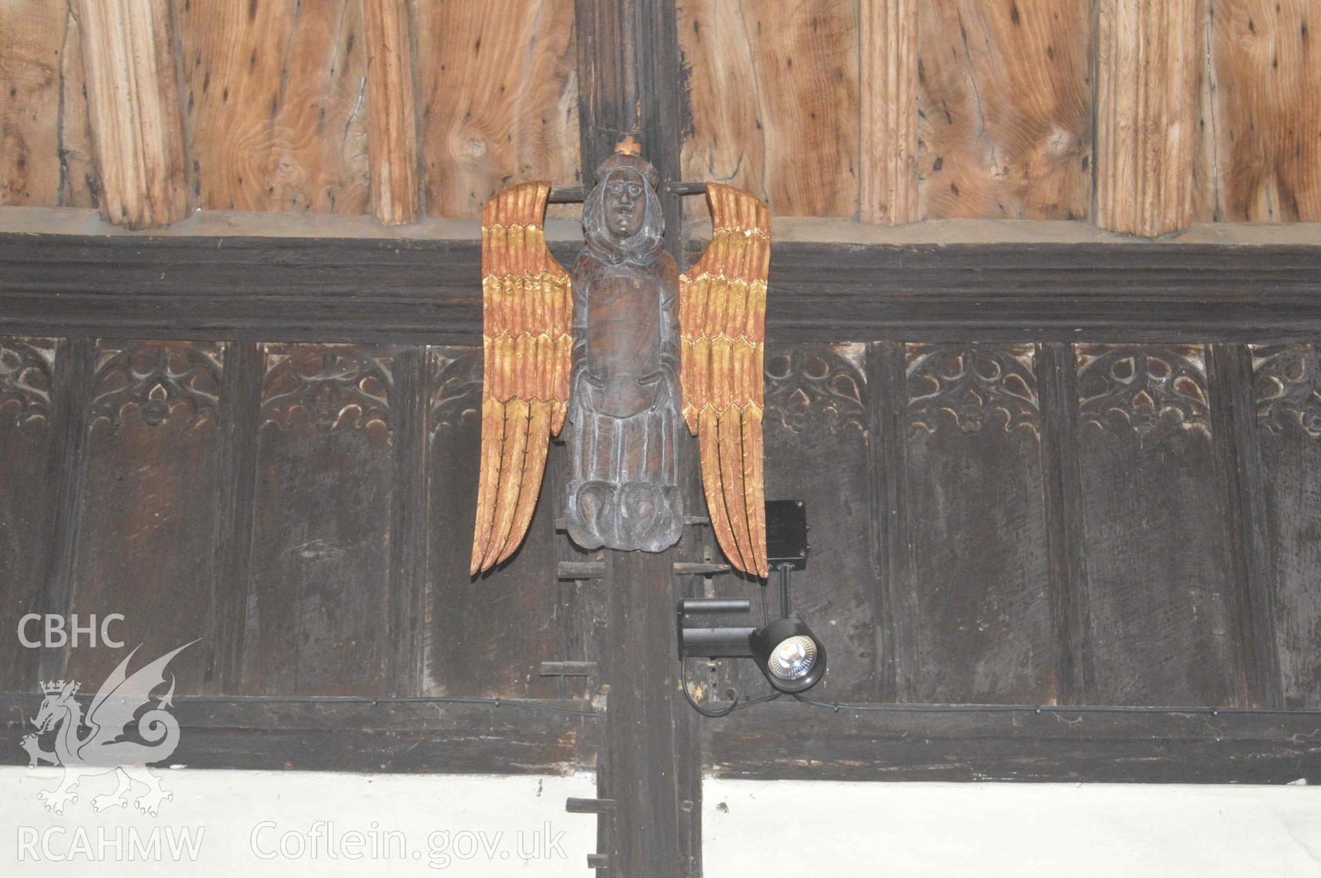 Photograph showing carved angel, original, north wall, North Chancel. From an Archaeological Survey and Watching Brief of St Cynhafal’s Church, Llangynhafal, carried out by Clwyd-Powys Archaeological Trust in 2021. Project no. 2520.