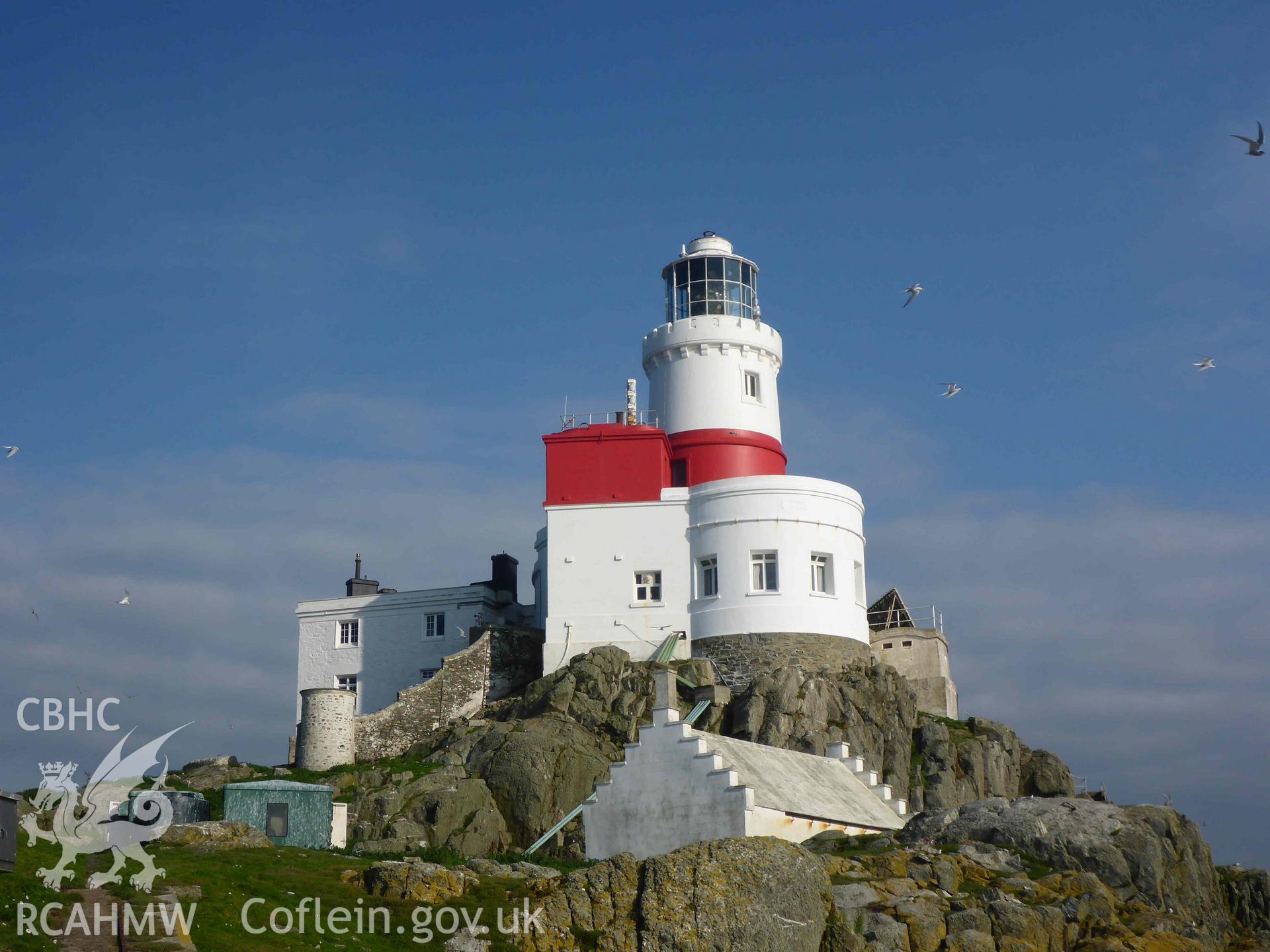 General view of the Skerries Lighthouse on 16/07/2024, looking from the northern landing stage towards the main building complex.