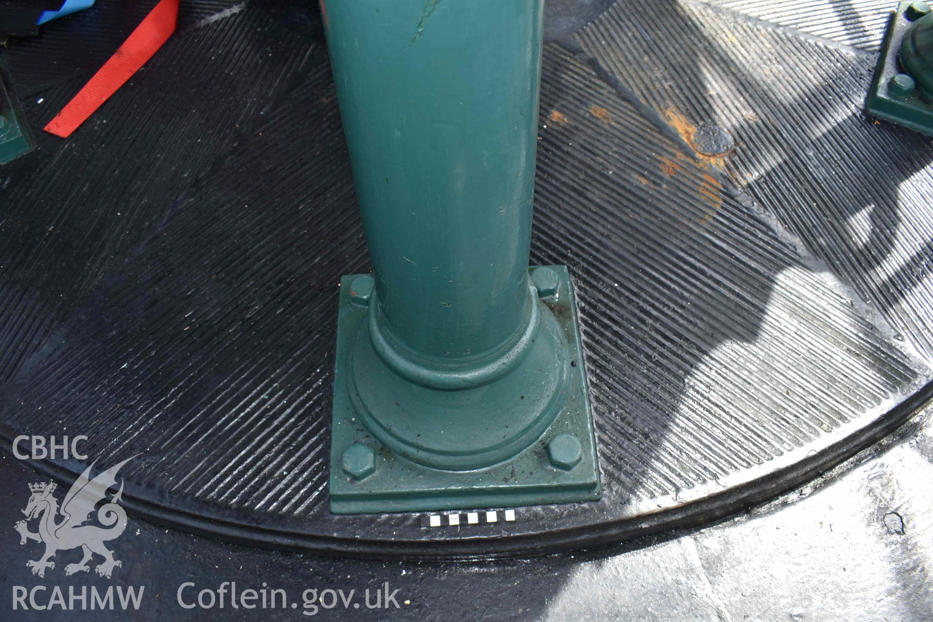 Detail of one of the Skerries Lighthouse lens pedestal's pillar bases on 16/07/2024. Scale is 10cm.