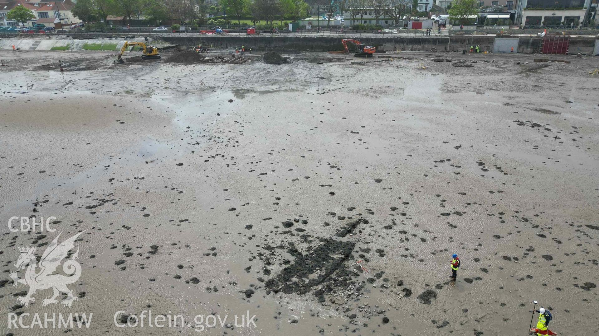 Mumbles Wreck 3, oblique view looking southwest on 08/05/2024, scales are 1m. Ongoing sea defence works are visible in the background.