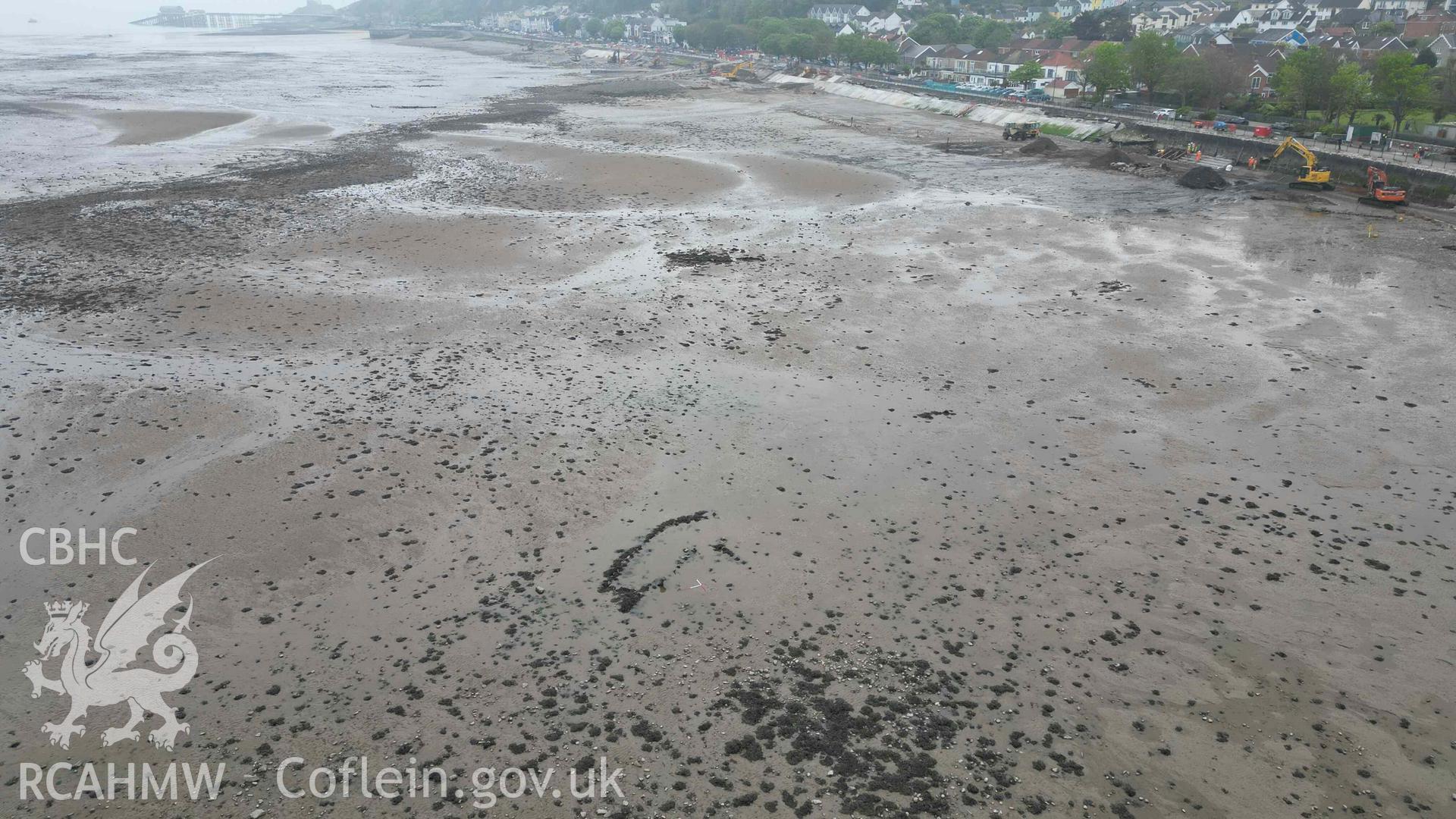 Mumbles Wreck 4, oblique view looking southeast on 08/05/2024, scales are 1m. Ongoing sea defence works are visible in the background. Mumbles Wreck 3 is visible directly beyond Mumbles Wreck 4.