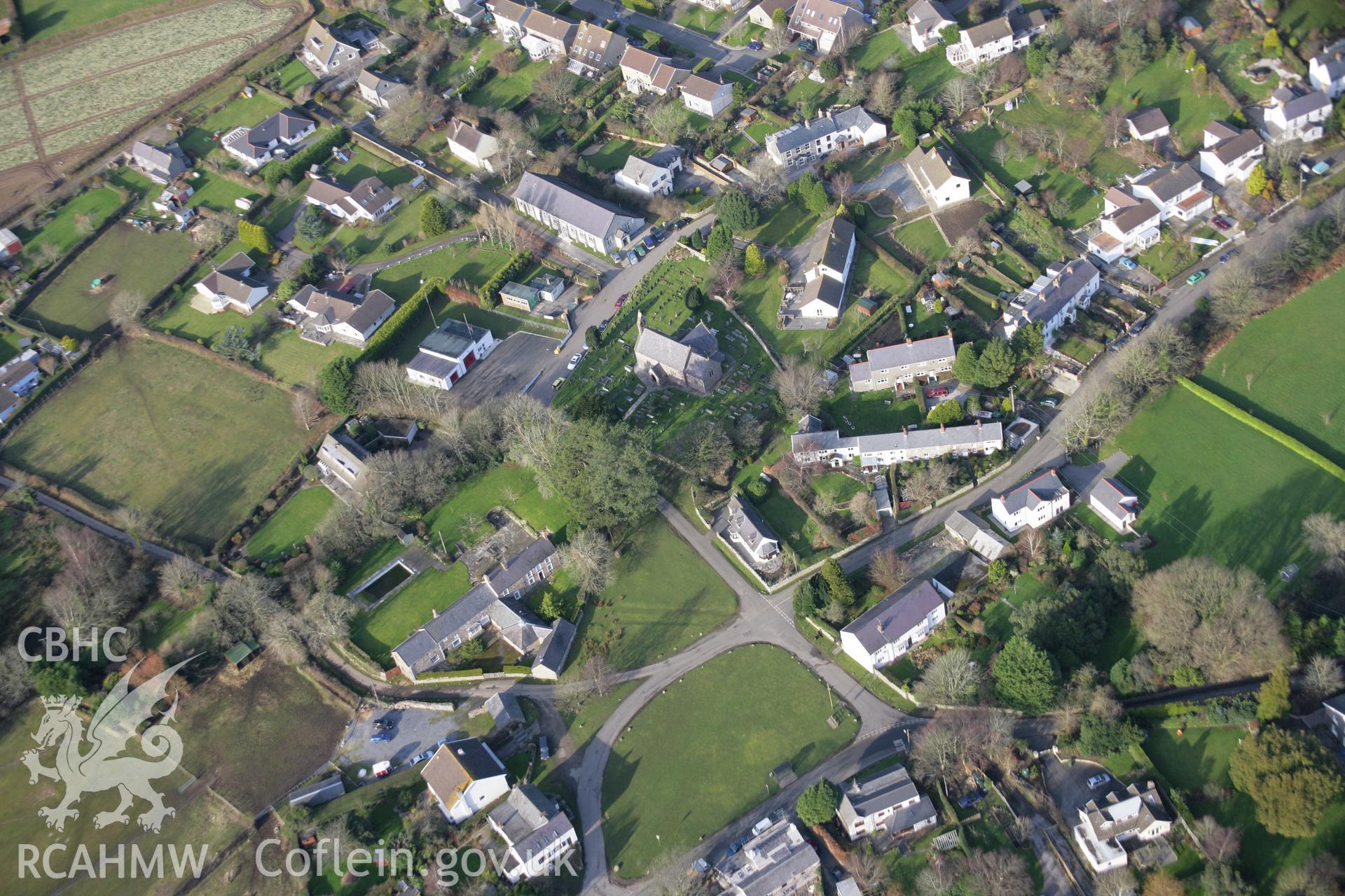 RCAHMW colour oblique aerial photograph of St George's Church, Reynoldston, viewed from the south. Taken on 26 January 2006 by Toby Driver