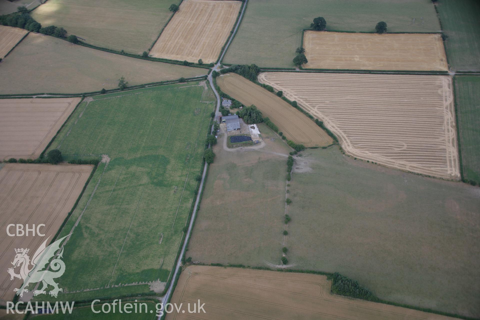 RCAHMW colour oblique aerial photograph of Four Stones. Taken on 27 July 2006 by Toby Driver.