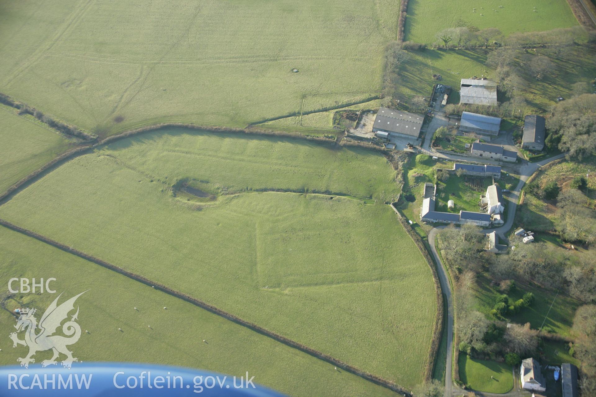 RCAHMW colour oblique aerial photograph of Coedcanlas Garden Earthworks, Martletwy, from the north-east. Taken on 26 January 2006 by Toby Driver.