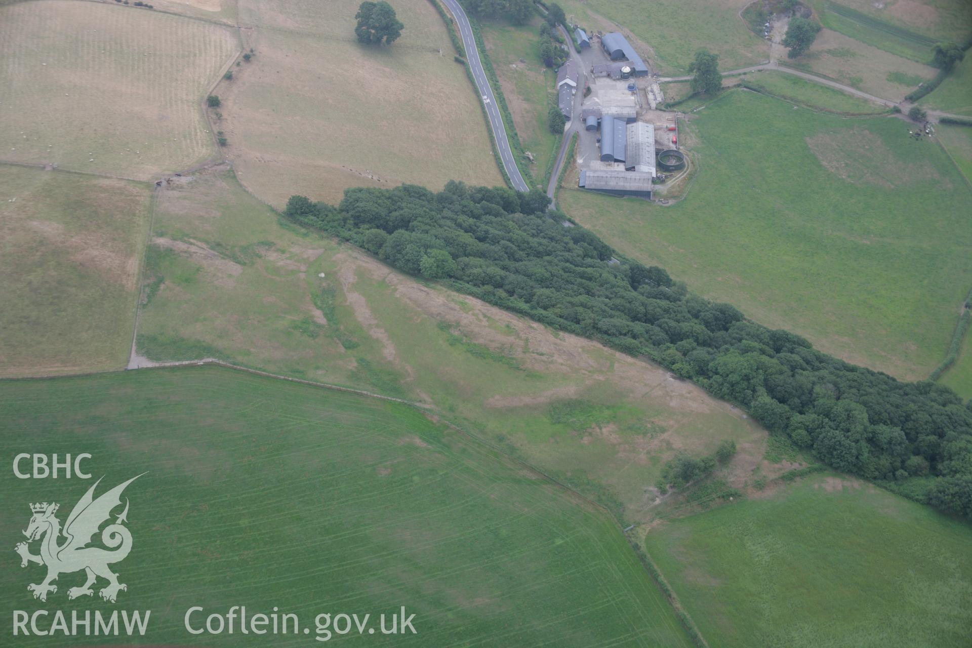 RCAHMW colour oblique aerial photograph of Coed-Parc Gaer, Llangybi. Taken on 21 July 2006 by Toby Driver.