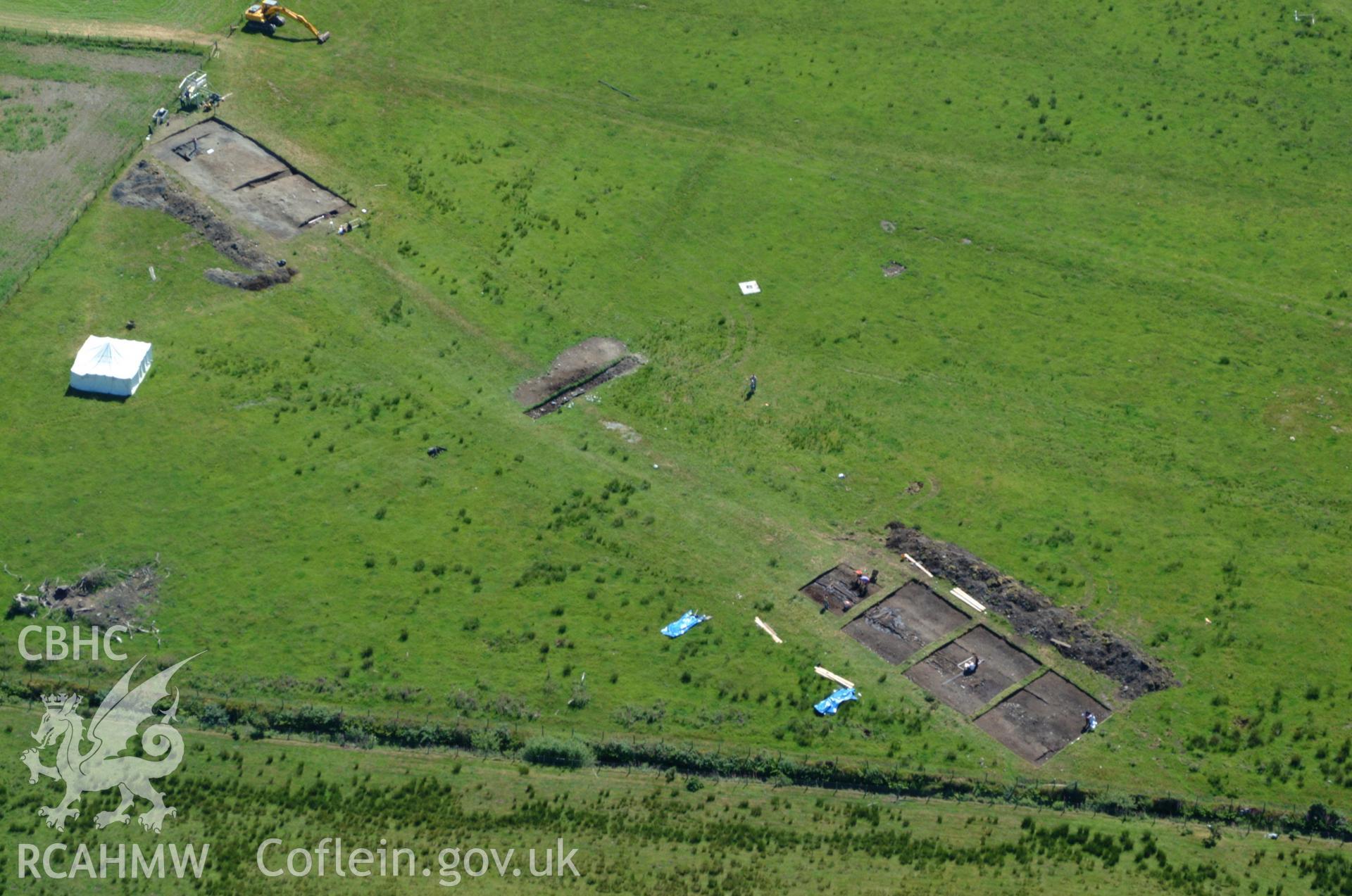 RCAHMW colour oblique aerial photograph of Llangynfelin Timber Trackway taken on 14/06/2004 by Toby Driver