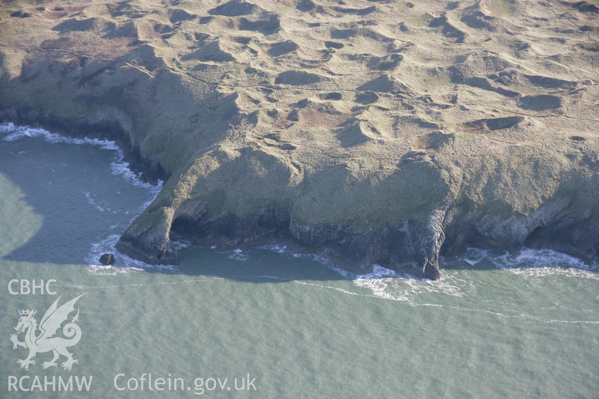 RCAHMW colour oblique aerial photograph of Culver Hole and the cliffs from the north-west. Taken on 26 January 2006 by Toby Driver.