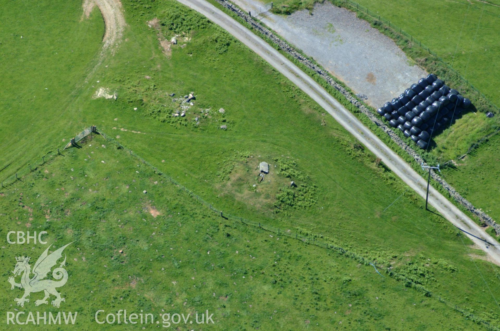 RCAHMW colour oblique aerial photograph of Bedd Taliesin taken on 14/06/2004 by Toby Driver