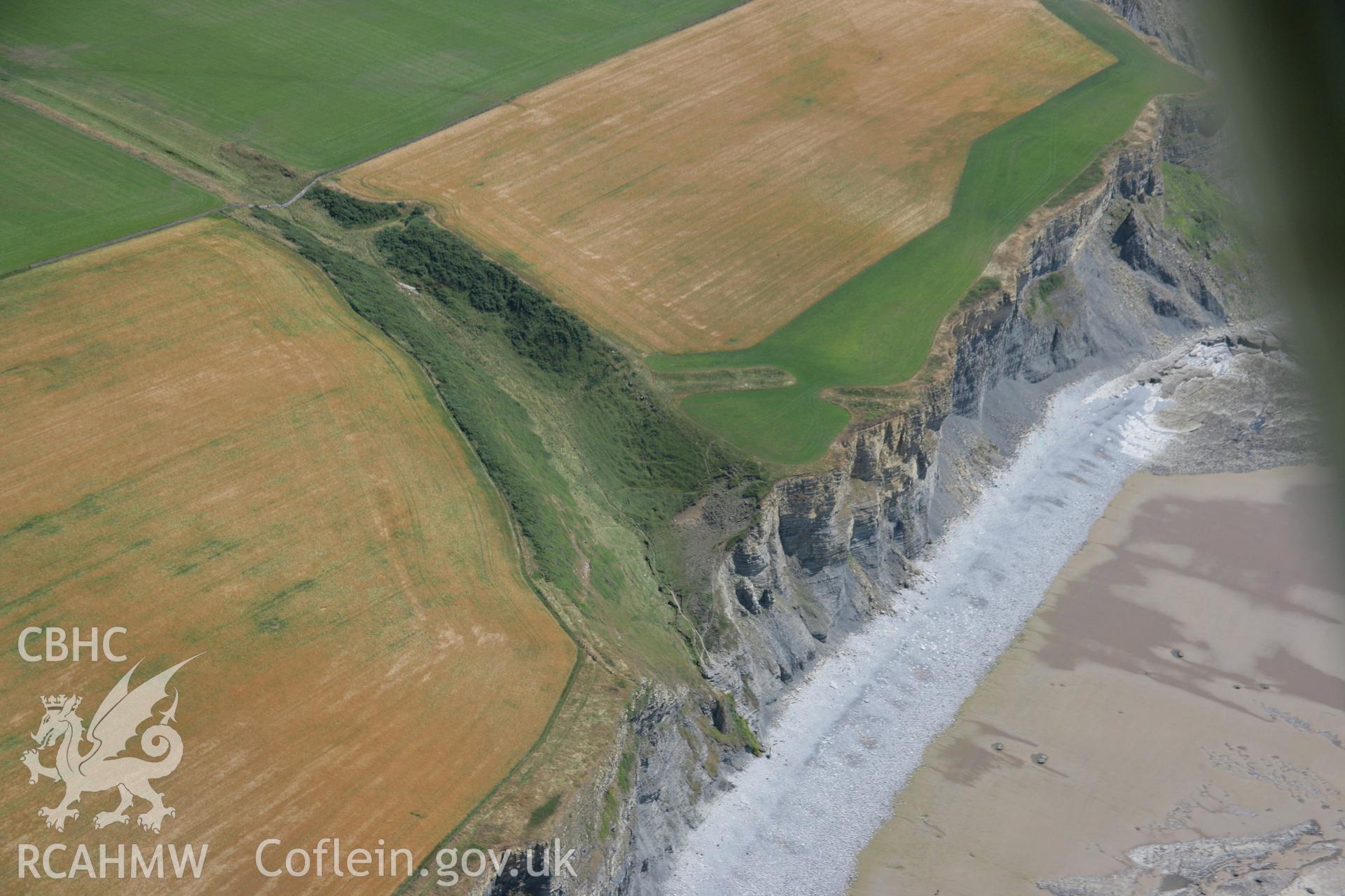 RCAHMW colour oblique aerial photograph of Cwm Bach Enclosure. Taken on 24 July 2006 by Toby Driver.