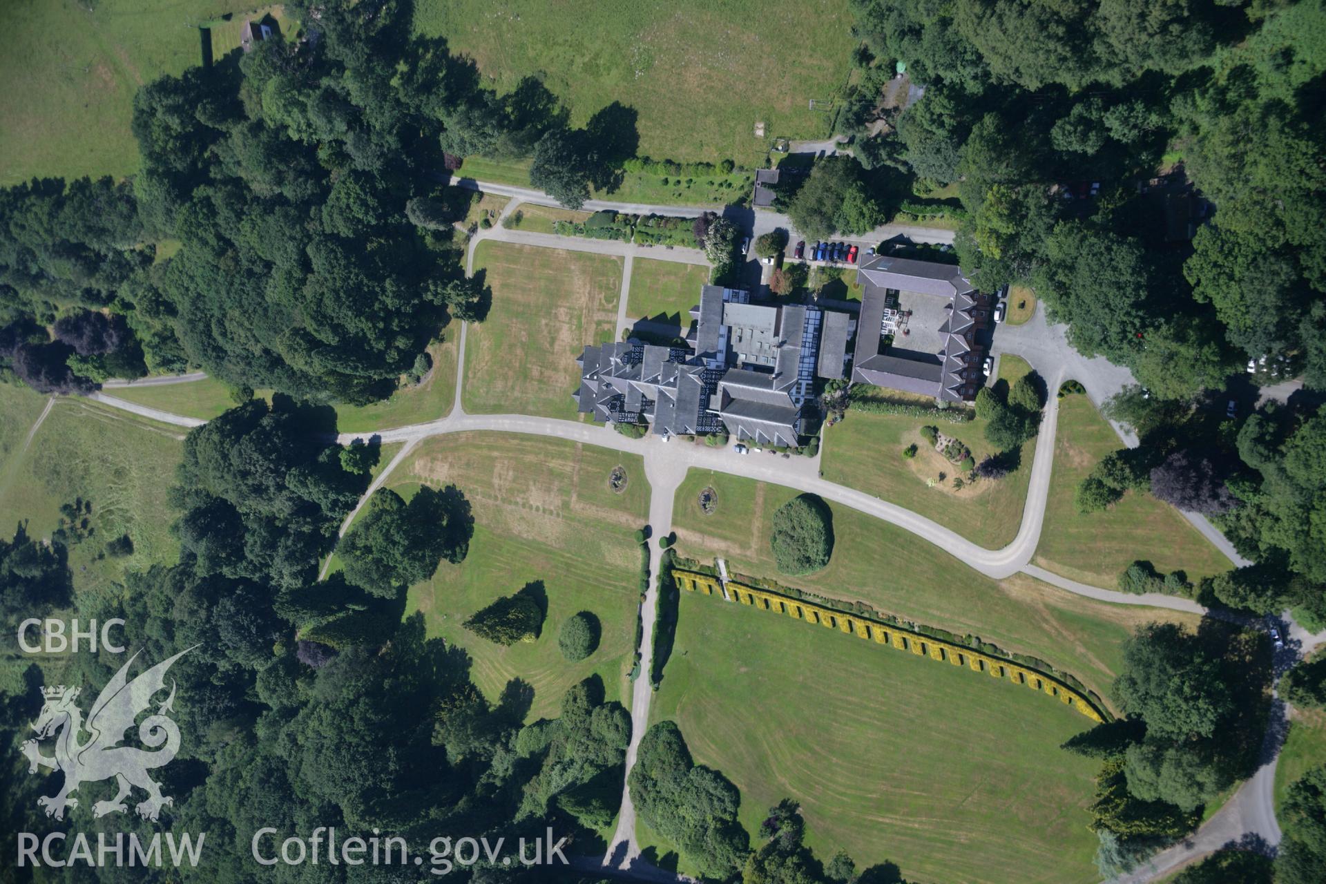 RCAHMW colour oblique aerial photograph of Gregynog Hall Garden, Tregynon, showing parchmarks. Taken on 17 July 2006 by Toby Driver.