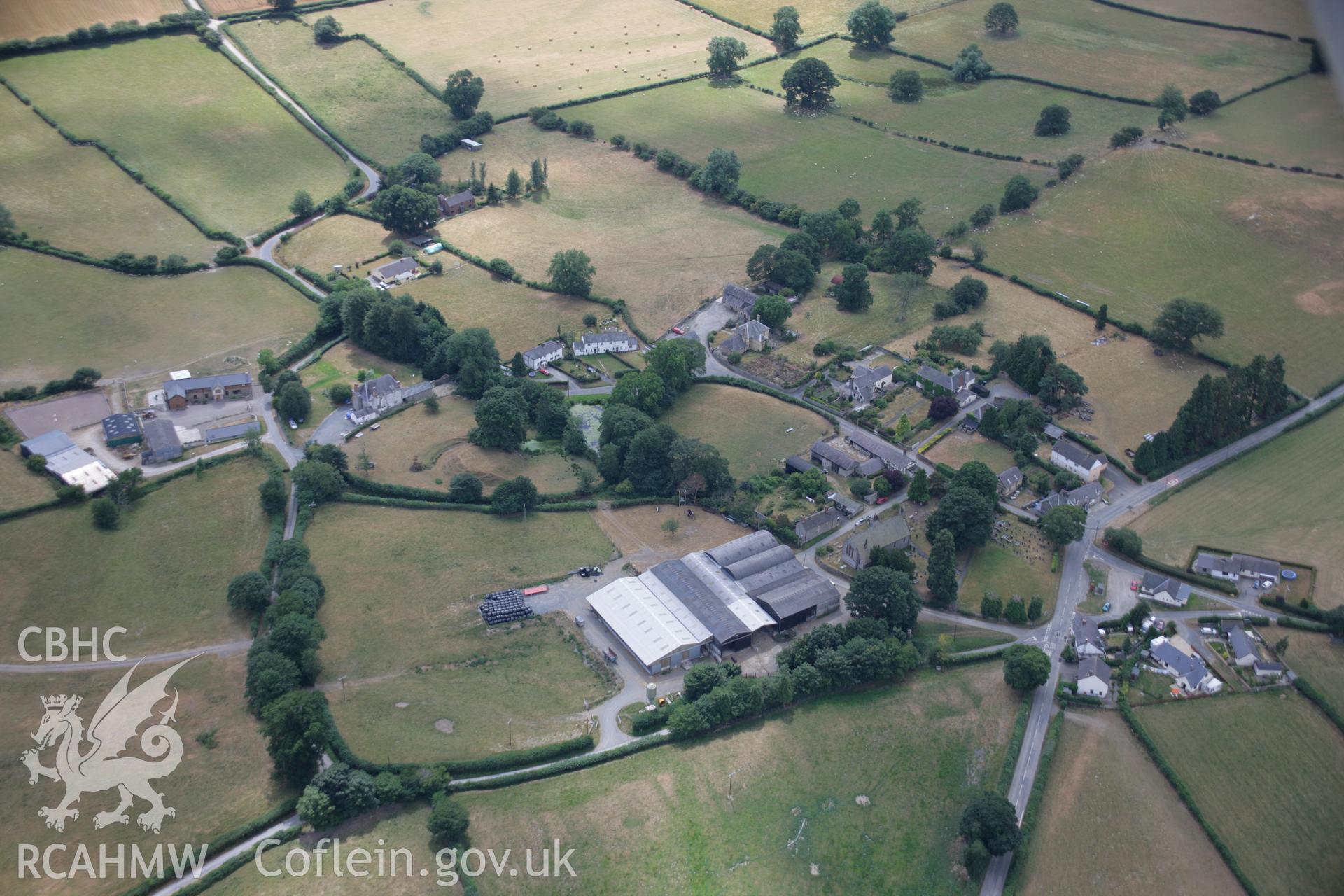 RCAHMW colour oblique aerial photograph of Kinnerton Court Motte. Taken on 27 July 2006 by Toby Driver.