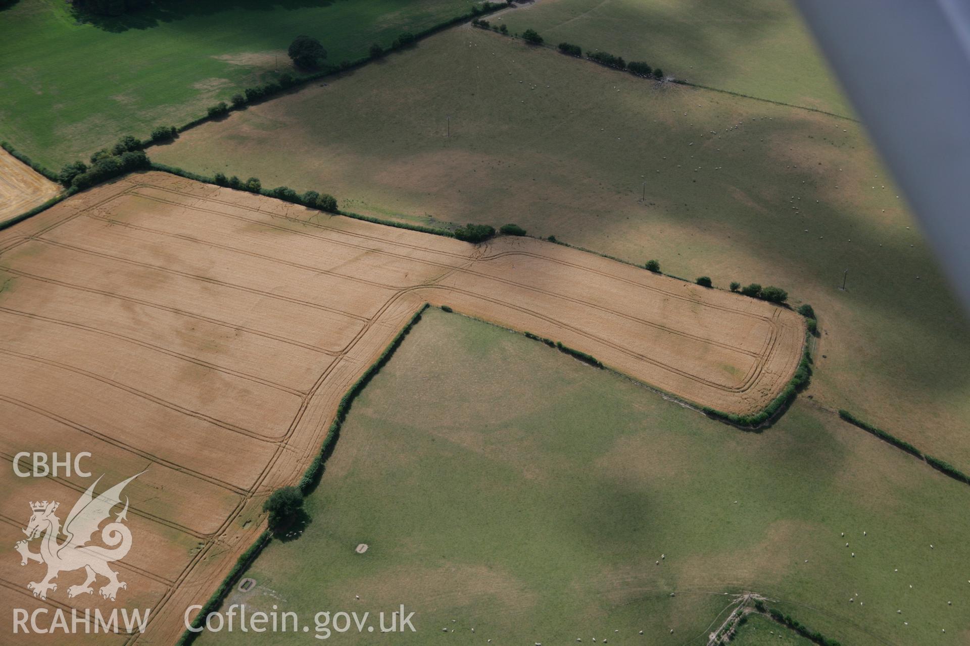 RCAHMW colour oblique aerial photograph of Womaston. Taken on 27 July 2006 by Toby Driver.