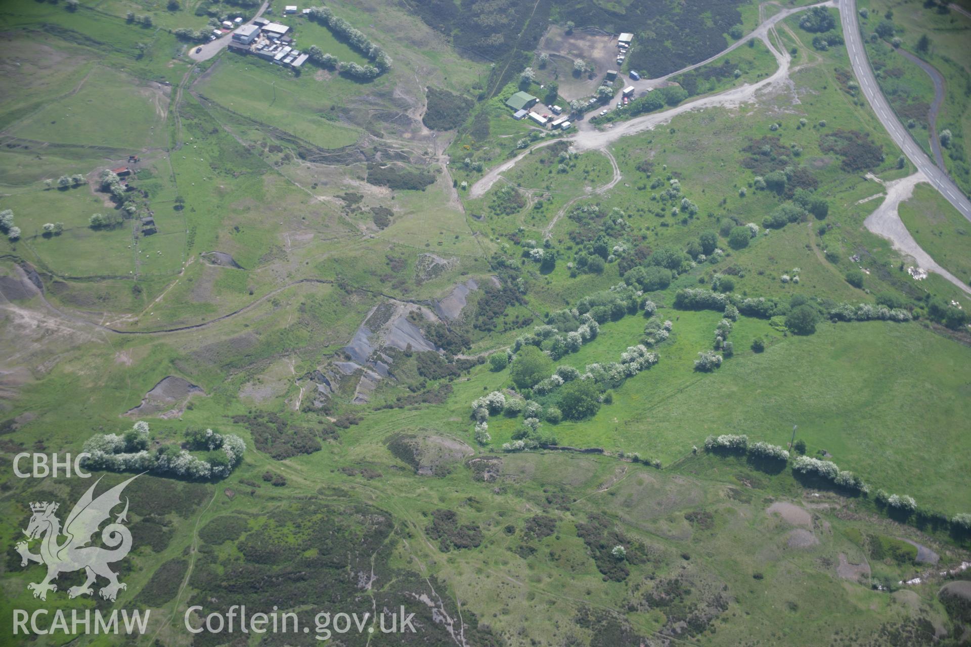 RCAHMW colour oblique aerial photograph of the south portal of the Pwll Du Tunnel on Hill's Tramroad from the north-west. Taken on 09 June 2006 by Toby Driver.