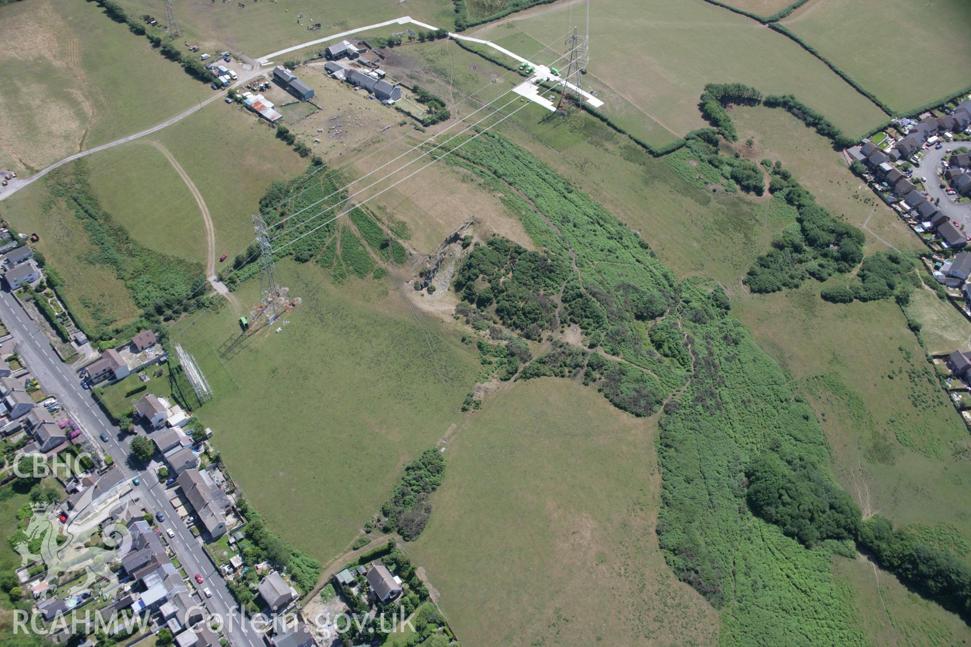 RCAHMW colour oblique aerial photograph of Pen-y-Castell. Taken on 24 July 2006 by Toby Driver.