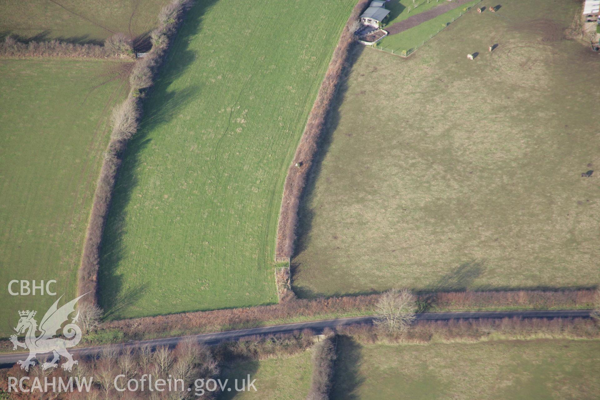 RCAHMW colour oblique aerial photograph of Oldwalls West Standing Stone, viewed from the south. Taken on 26 January 2006 by Toby Driver.