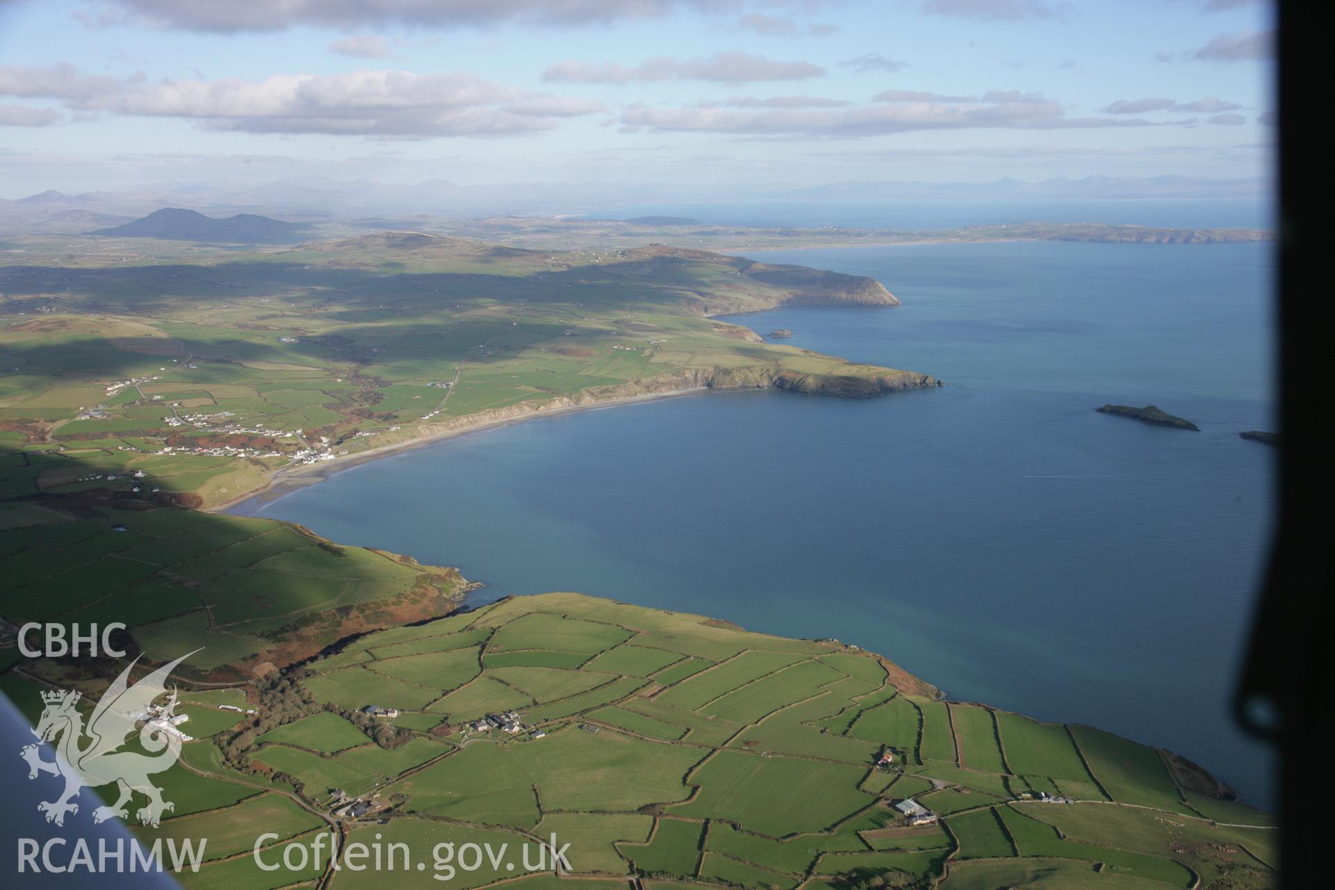 RCAHMW colour oblique aerial photograph of Aberdaron and the landscape from the west. Taken on 09 February 2006 by Toby Driver.