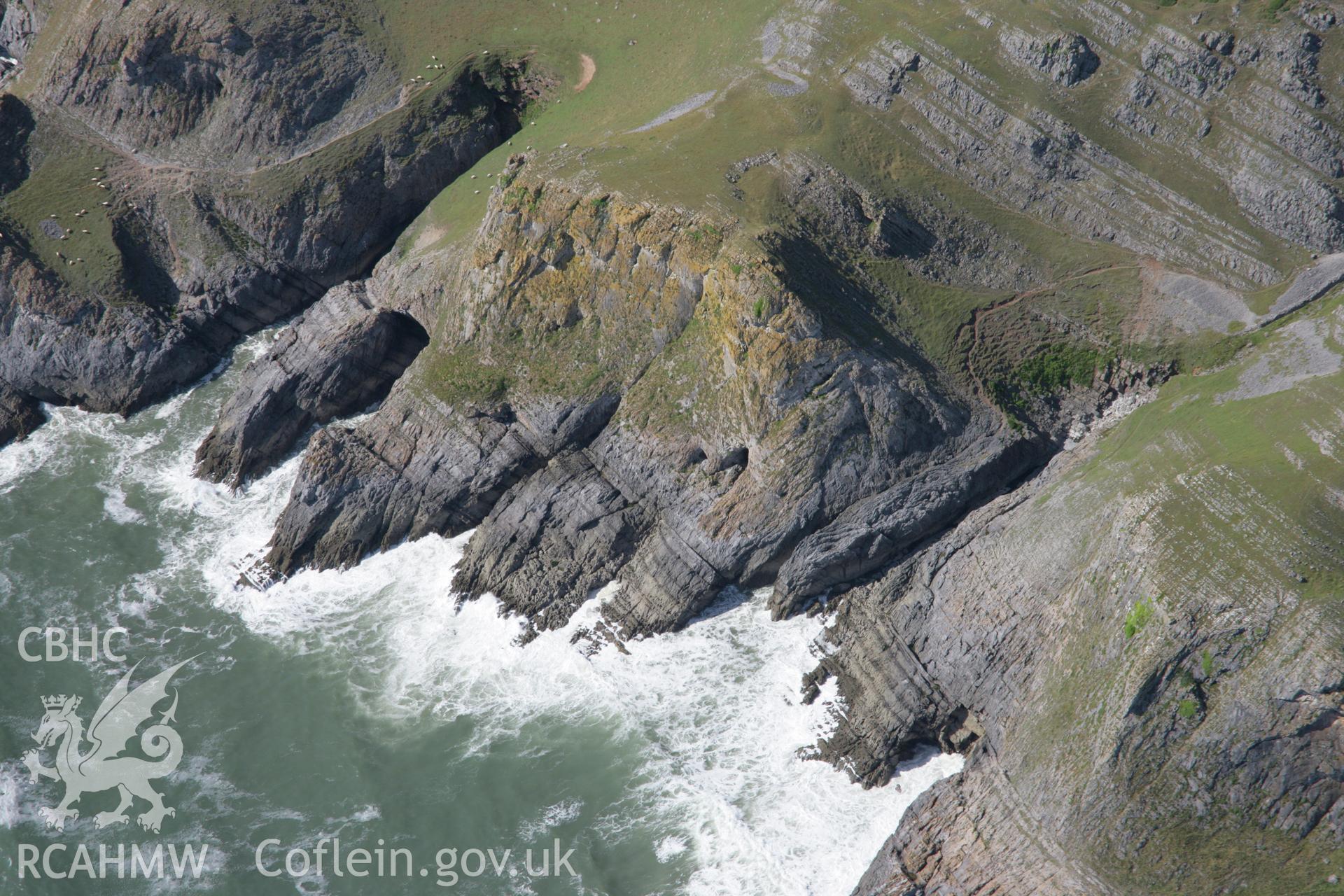 RCAHMW colour oblique aerial photograph of Goat's Hole Cave, Paviland. Taken on 11 July 2006 by Toby Driver.