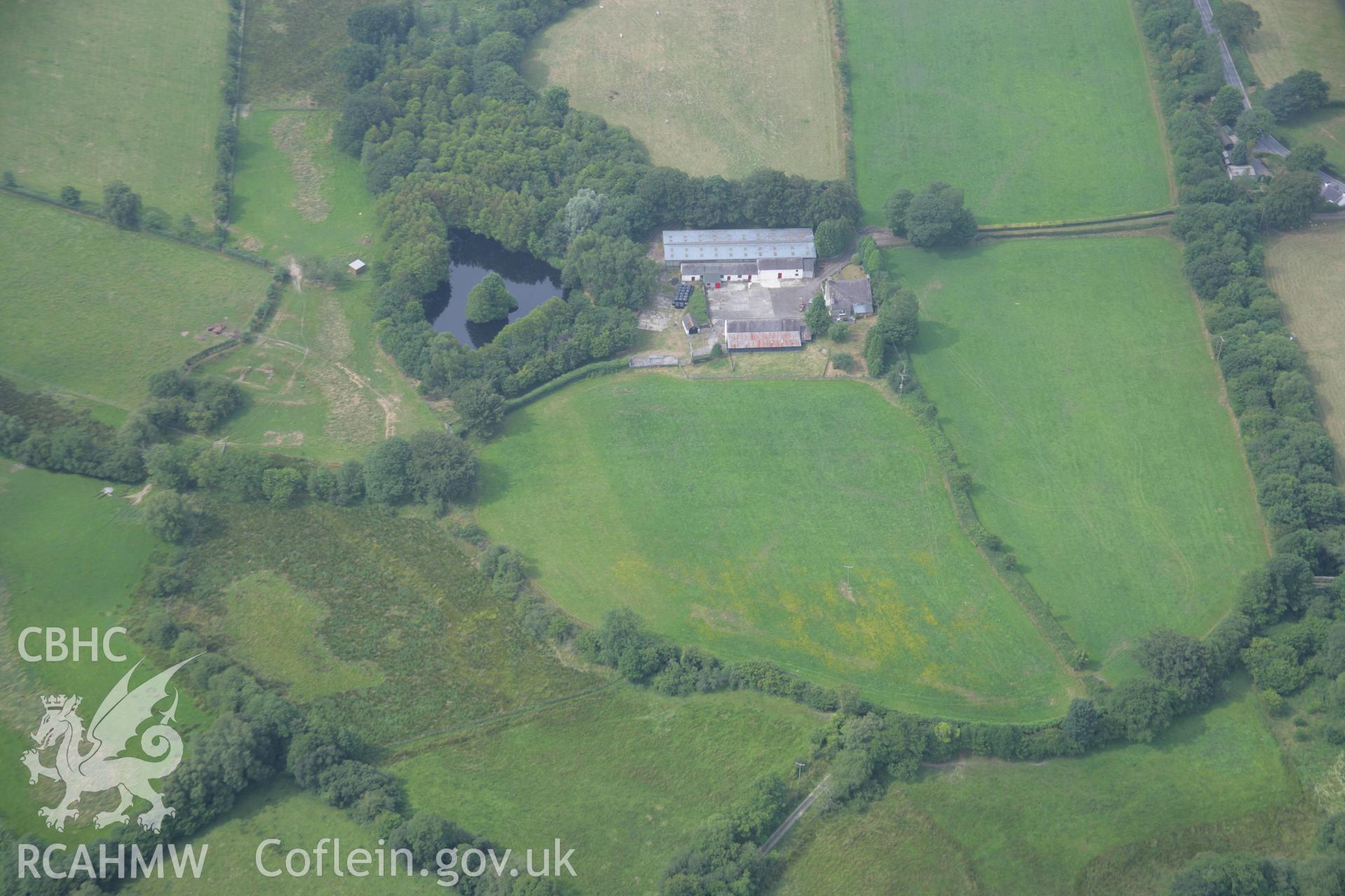 RCAHMW colour oblique aerial photograph of Llanio Roman Fort and settlement (Bremia). Taken on 21 July 2006 by Toby Driver.