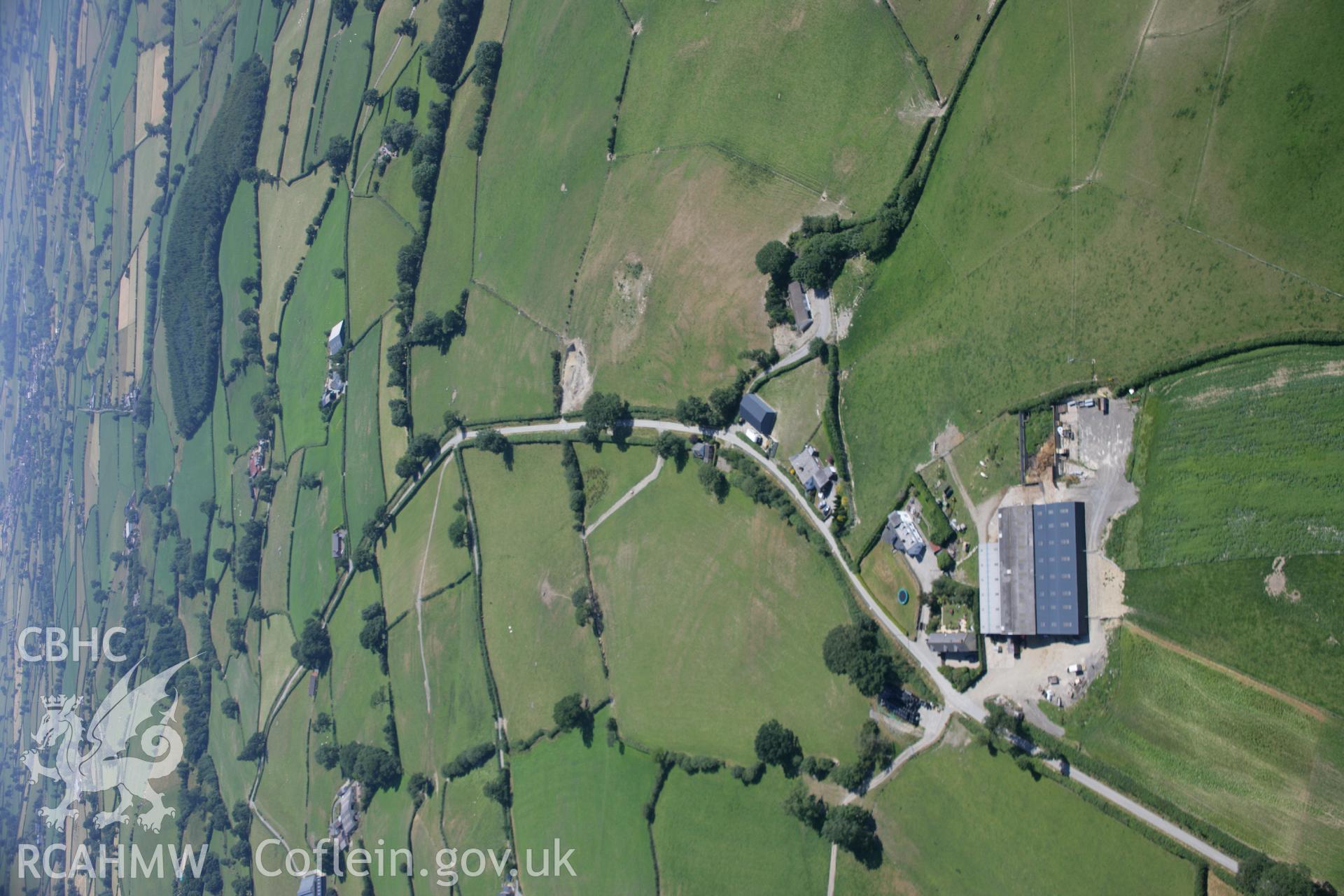 RCAHMW colour oblique aerial photograph of the Roman road between Carno and Trannon at Trefeglwys. Taken on 17 July 2006 by Toby Driver.