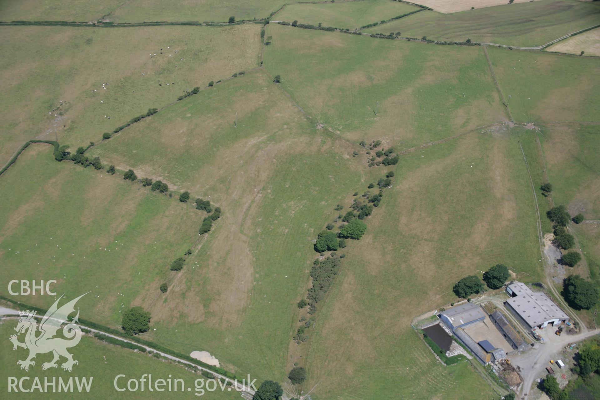 RCAHMW colour oblique aerial photograph of Cynnull-Mawr Enclosure. Taken on 17 July 2006 by Toby Driver.