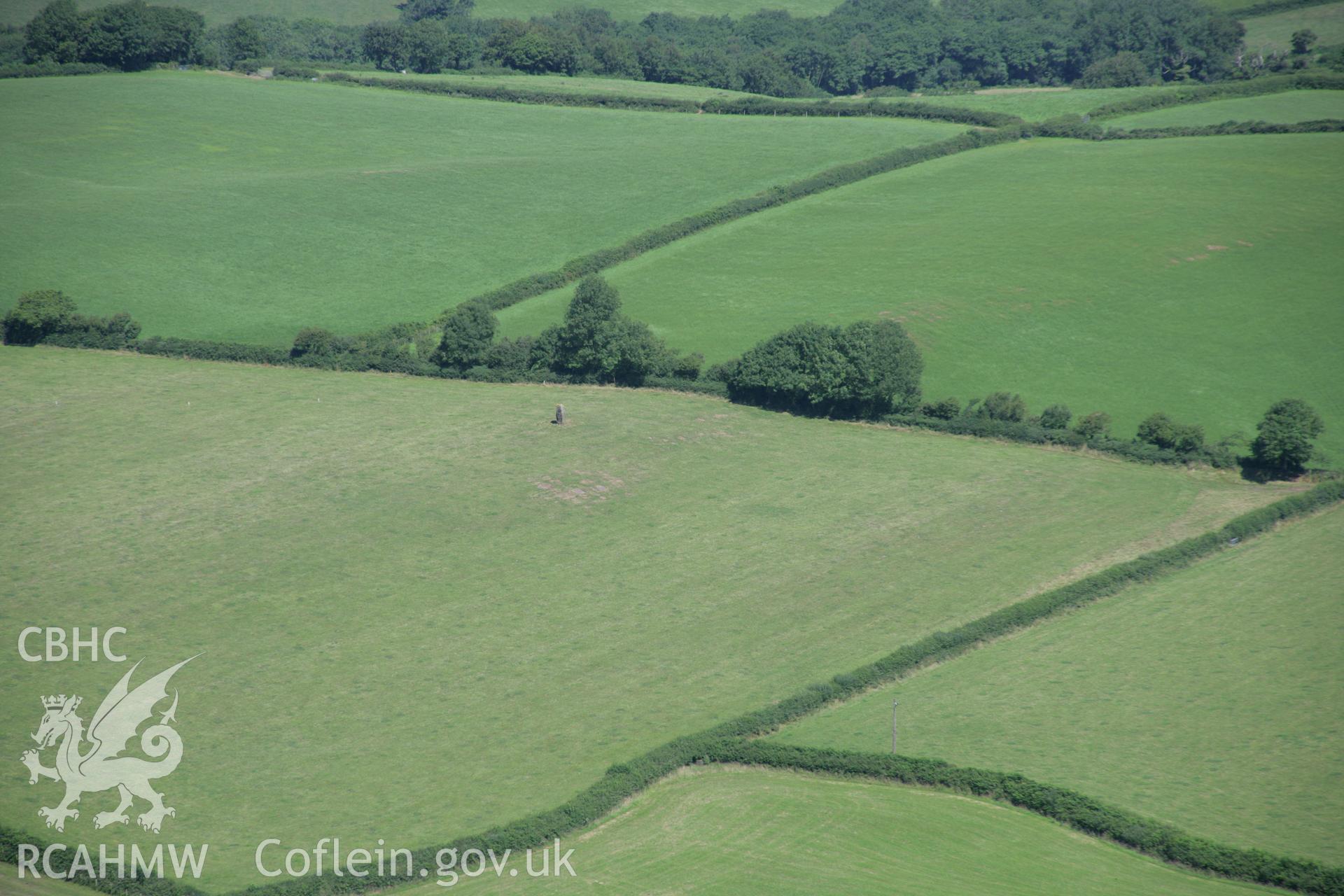 RCAHMW colour oblique aerial photograph of Halfway House Standing Stone (Maen Llwyd), Llangendeirne. Taken on 24 July 2006 by Toby Driver.