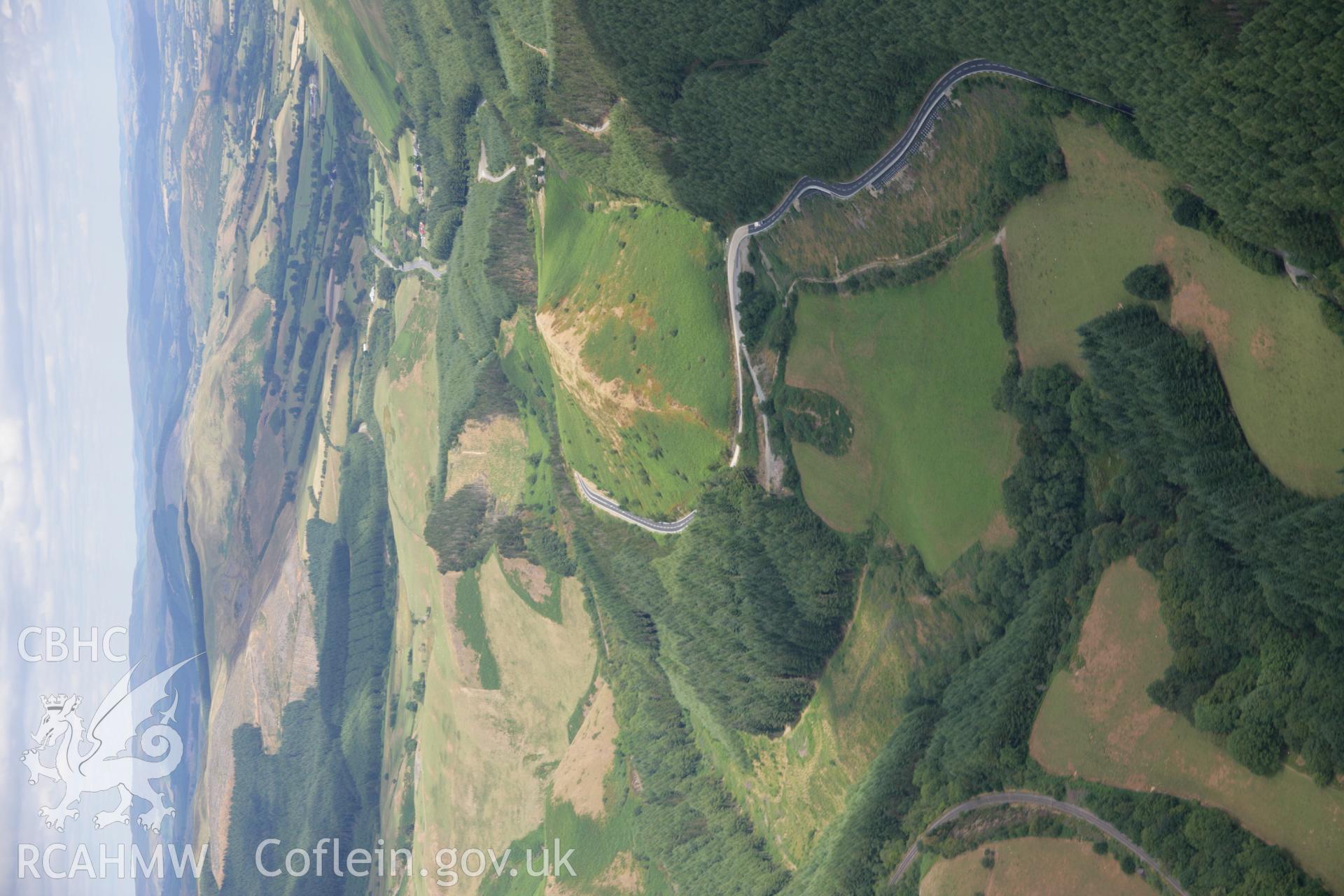 RCAHMW colour oblique aerial photograph of Sugar Loaf Hillfort. Taken on 27 July 2006 by Toby Driver.