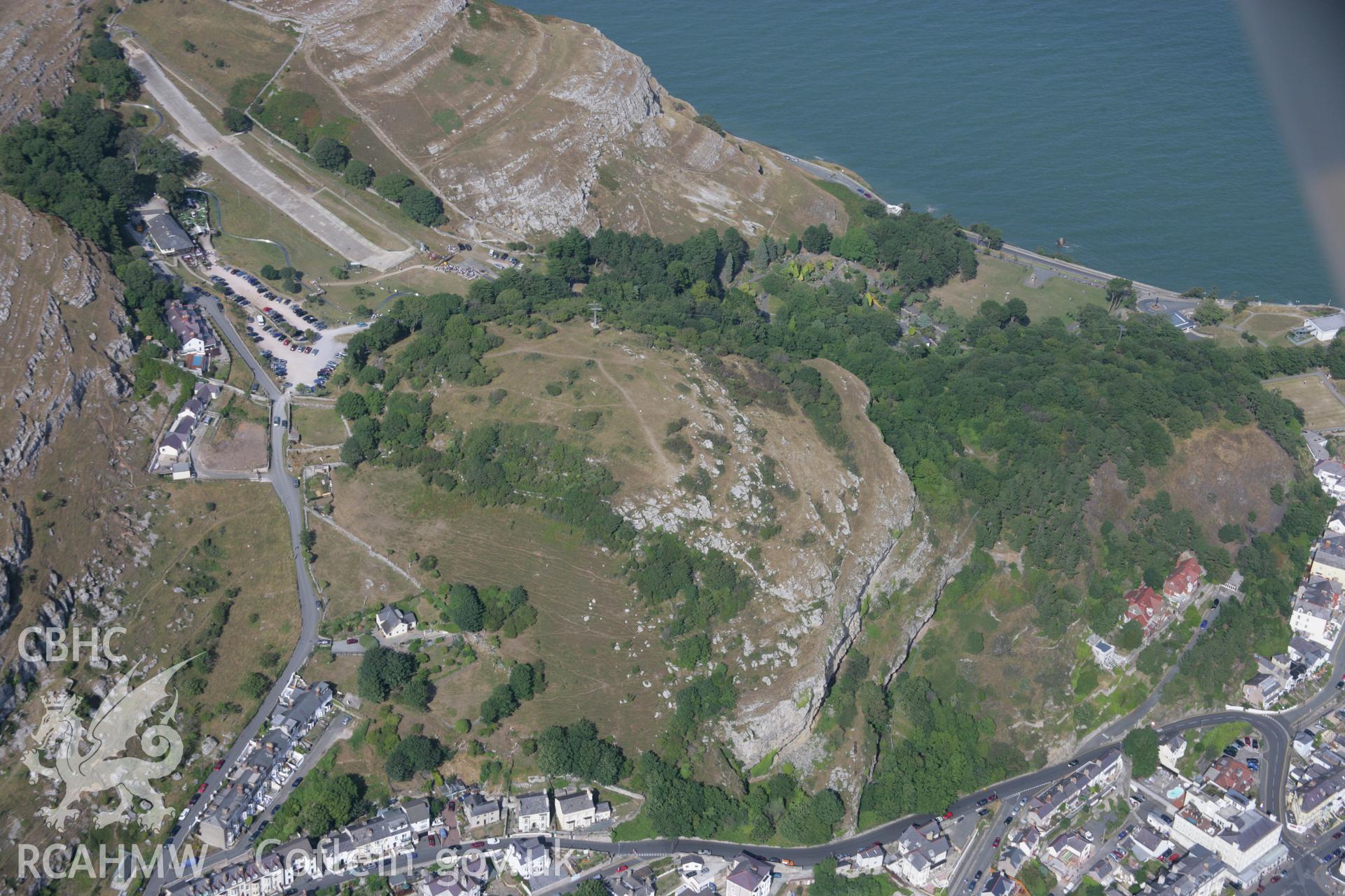 RCAHMW colour oblique aerial photograph of Pen-y-Dinas Hillfort, Llandudno. Taken on 14 August 2006 by Toby Driver.