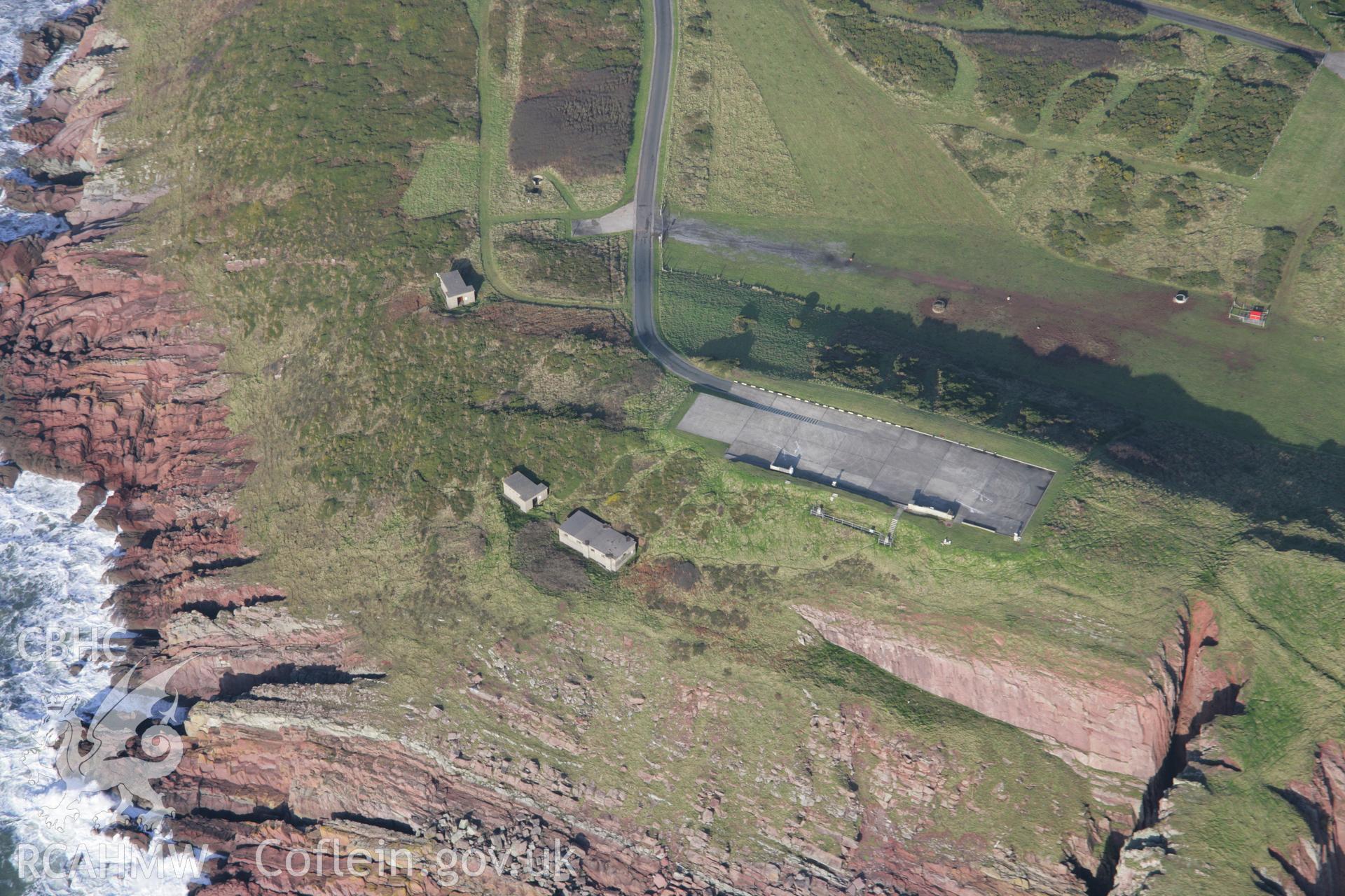 RCAHMW colour oblique aerial photograph of Manorbier Radar Station, Old Castle Head, Manorbier, viewed from the south. Taken on 11 January 2006 by Toby Driver.