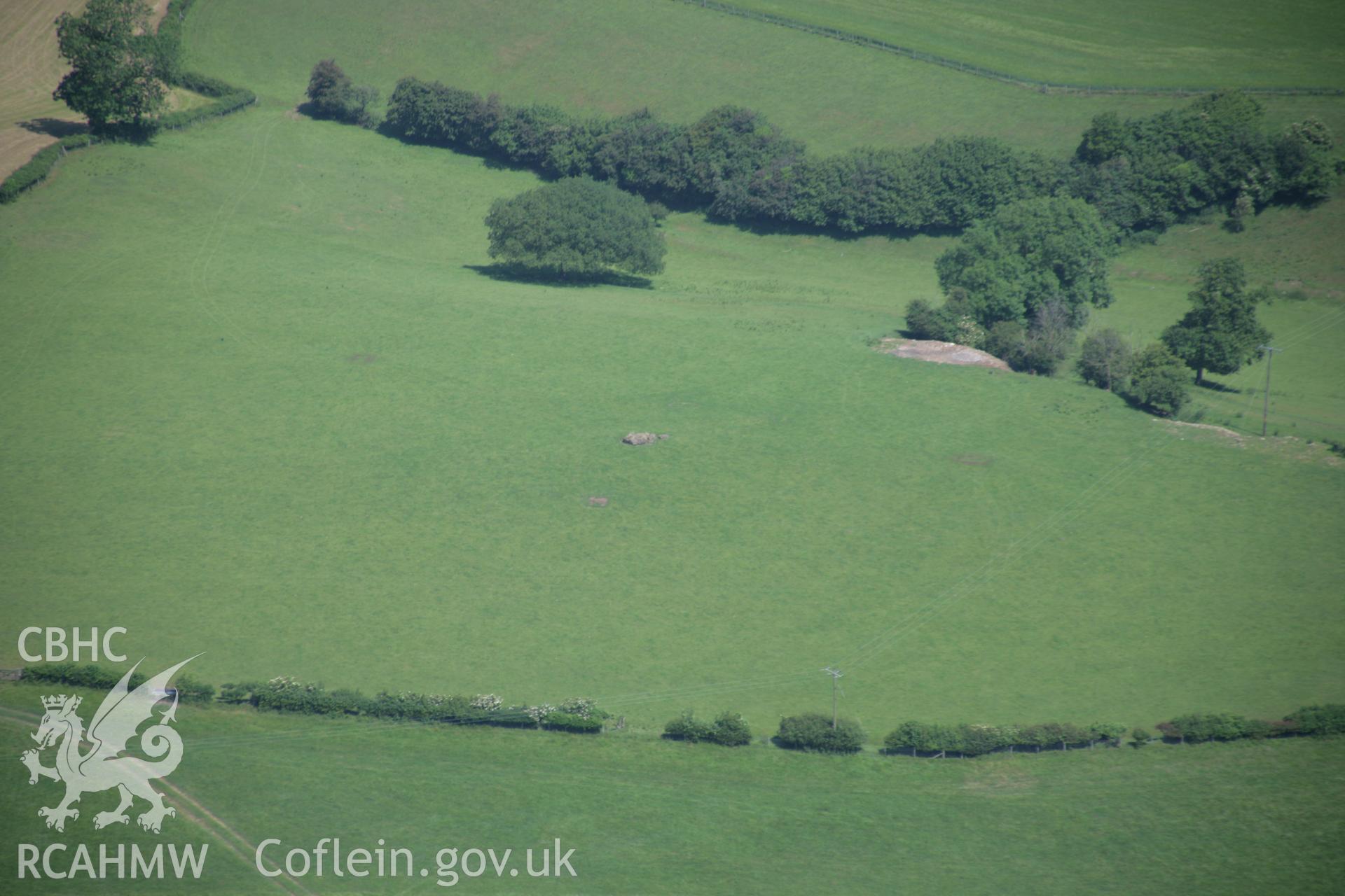 RCAHMW colour oblique photograph of Coed y Cym chambered tomb. Taken by Toby Driver on 29/06/2006.