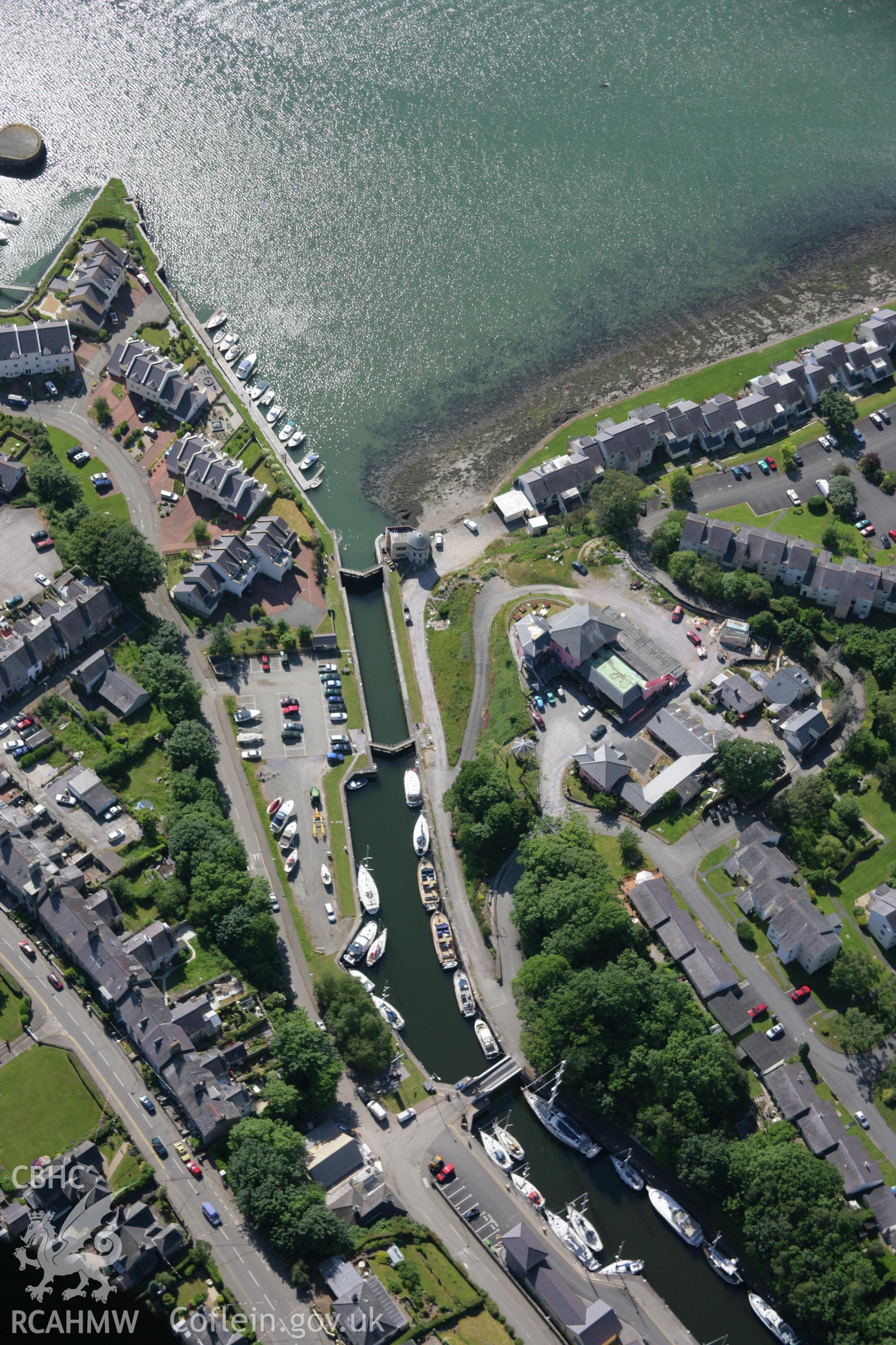 RCAHMW colour oblique aerial photograph of Y Felinheli Harbour from the east. Taken on 14 June 2006 by Toby Driver.