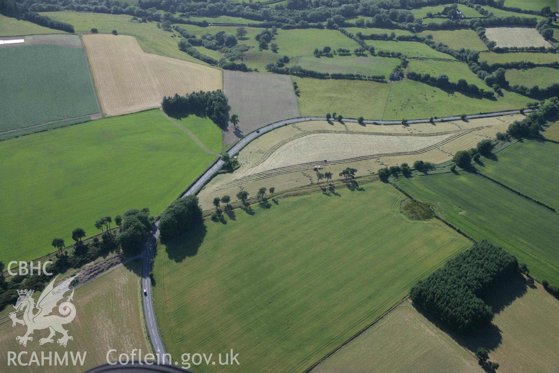 RCAHMW colour oblique aerial photograph of a section of Offa's Dyke extending 2143m south from The Firs, Rhos-y-Meirch. Taken on 13 July 2006 by Toby Driver.