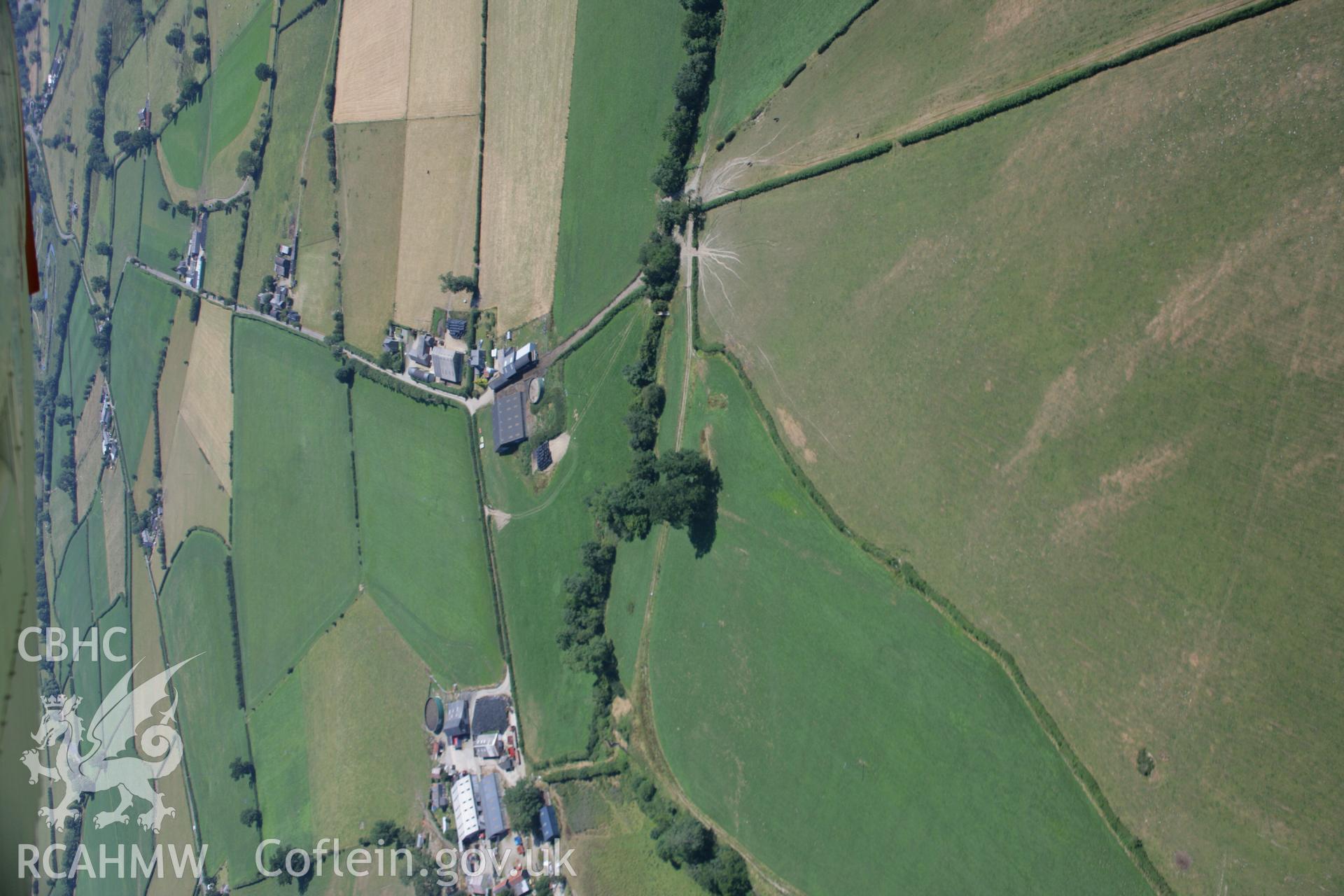 RCAHMW colour oblique aerial photograph of the Roman road between Carno and Trannon at Trefeglwys. Taken on 17 July 2006 by Toby Driver.