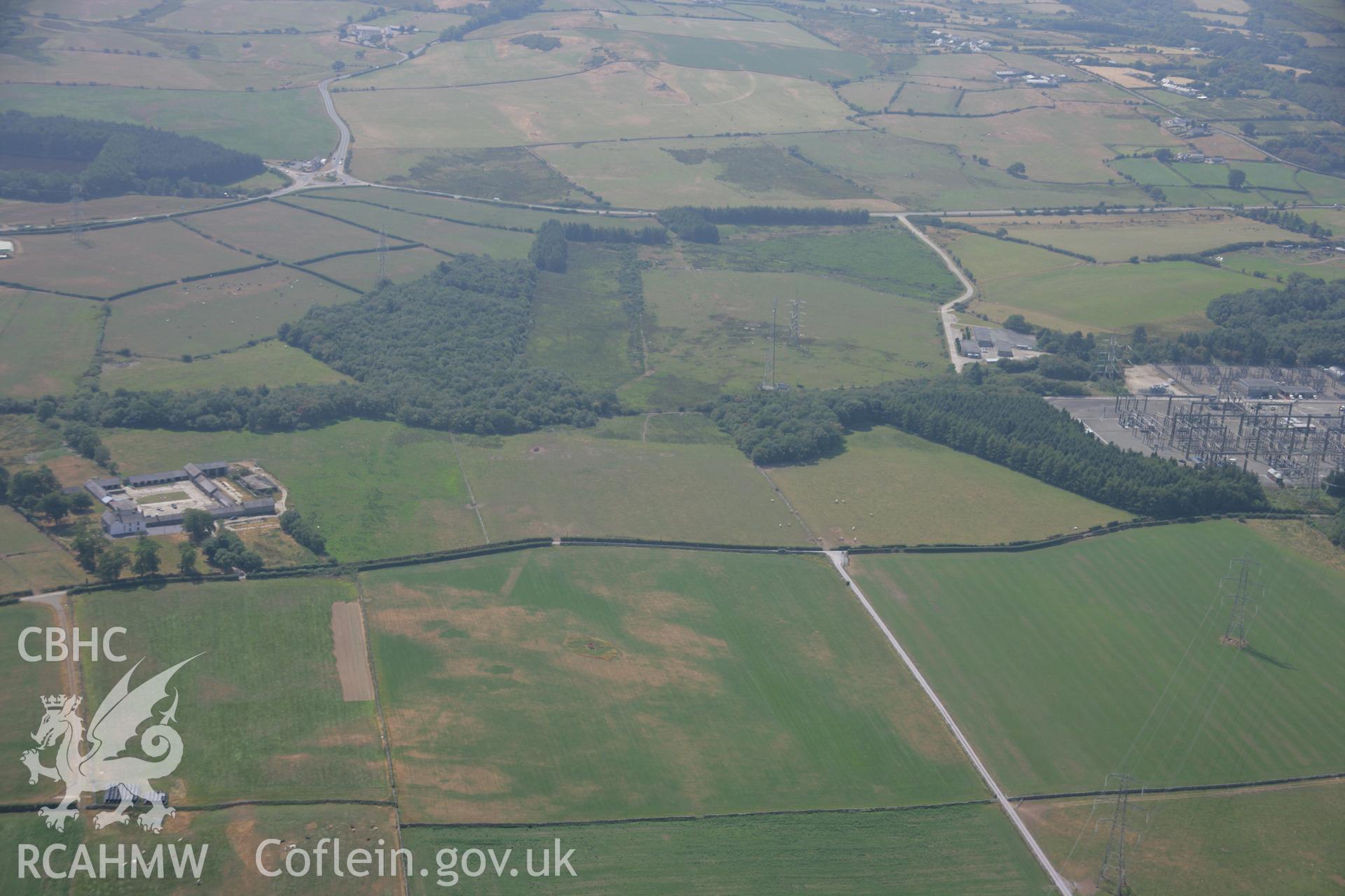 RCAHMW colour oblique aerial photograph of Roman road parchmarks Taken on 25 July 2006 by Toby Driver.