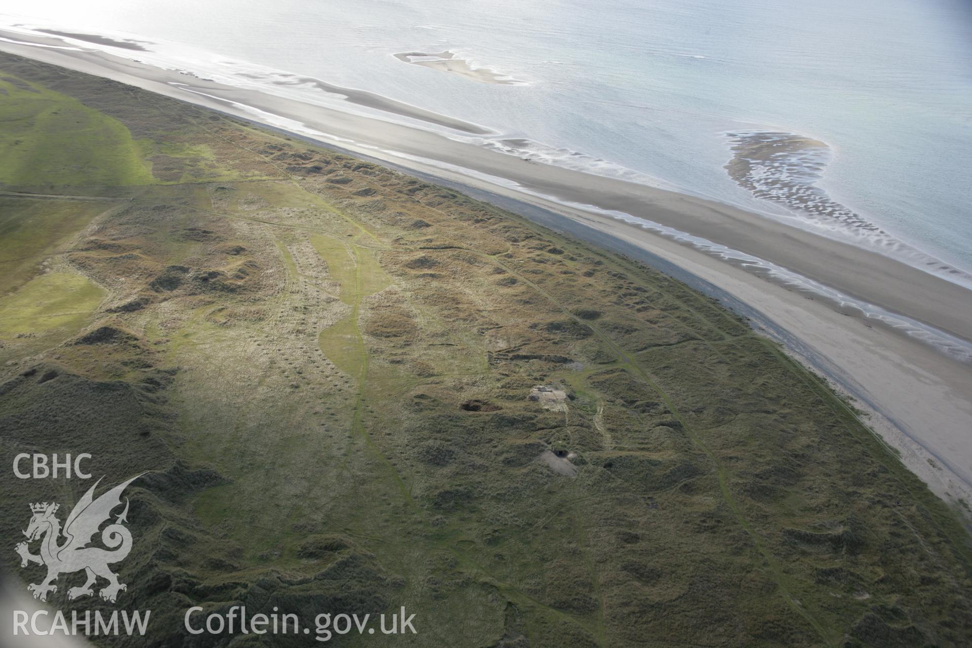 RCAHMW colour oblique aerial photograph of Llandwrog Airfield showing a possible minefield in dunes, viewed from the north-east. Taken on 09 February 2006 by Toby Driver.