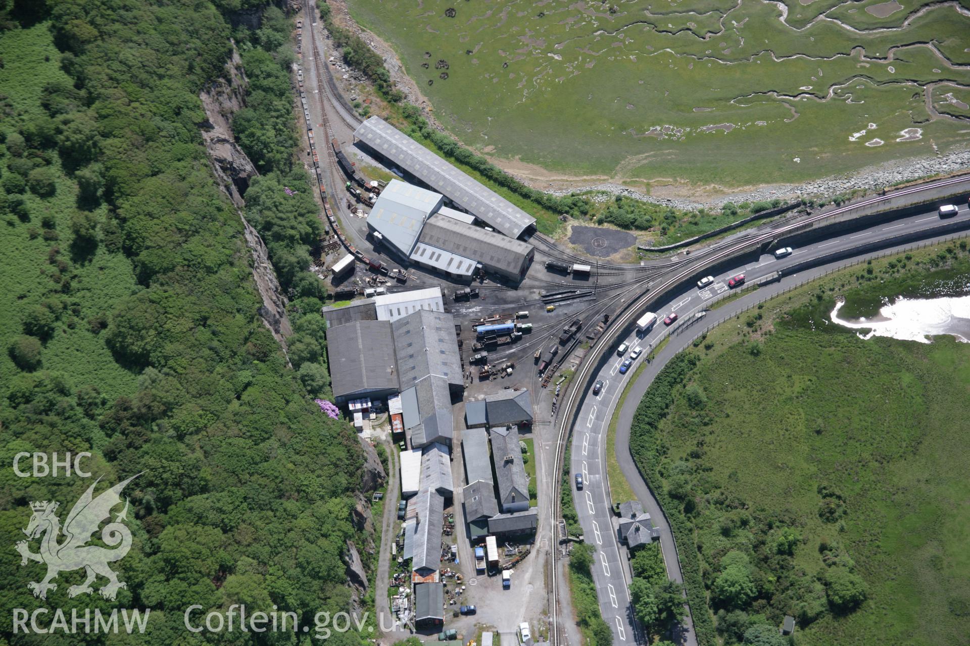 RCAHMW colour oblique aerial photograph of Boston Lodge Railway Workson the Ffestiniog Railway viewed from the north-east. Taken on 14 June 2006 by Toby Driver.