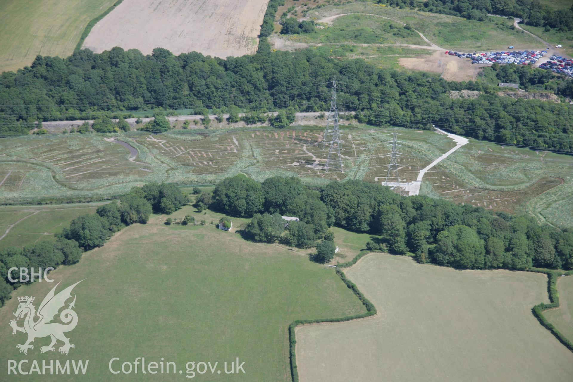 RCAHMW colour oblique aerial photograph of East Orchard Castle. Taken on 24 July 2006 by Toby Driver.