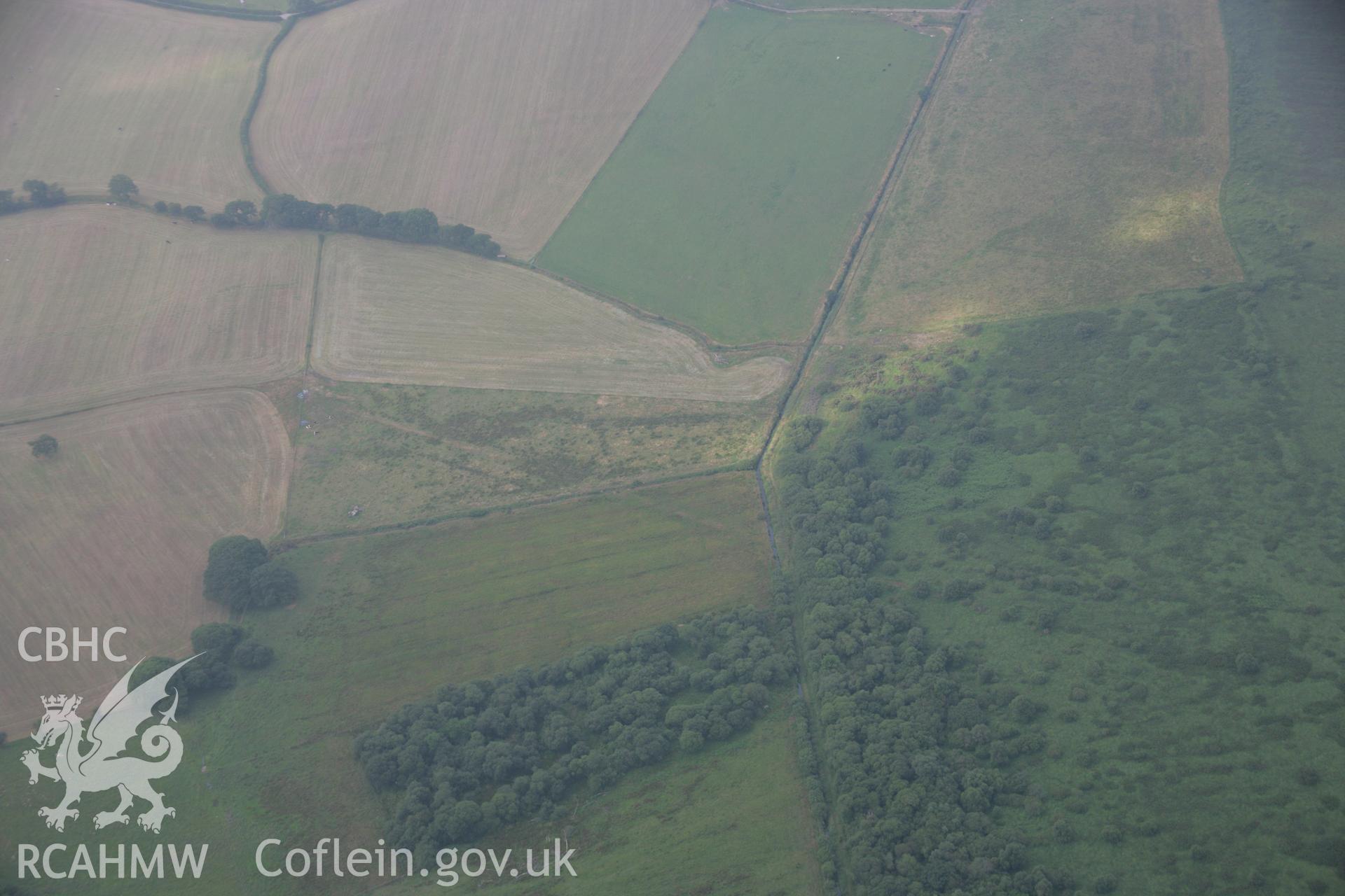 RCAHMW colour oblique aerial photograph of Llangynfelin Timber Trackway. Taken on 21 July 2006 by Toby Driver.