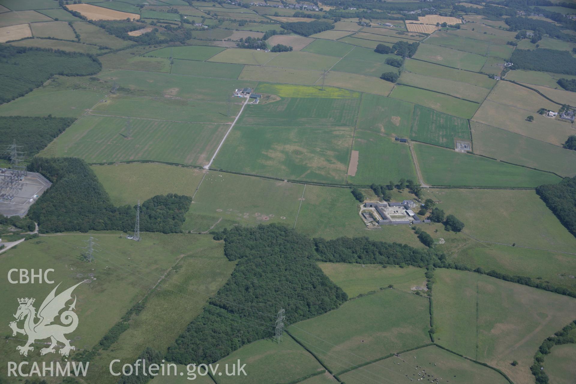 RCAHMW colour oblique aerial photograph of sections of Roman road at Ty'n-Llwyn. Taken on 18 July 2006 by Toby Driver.