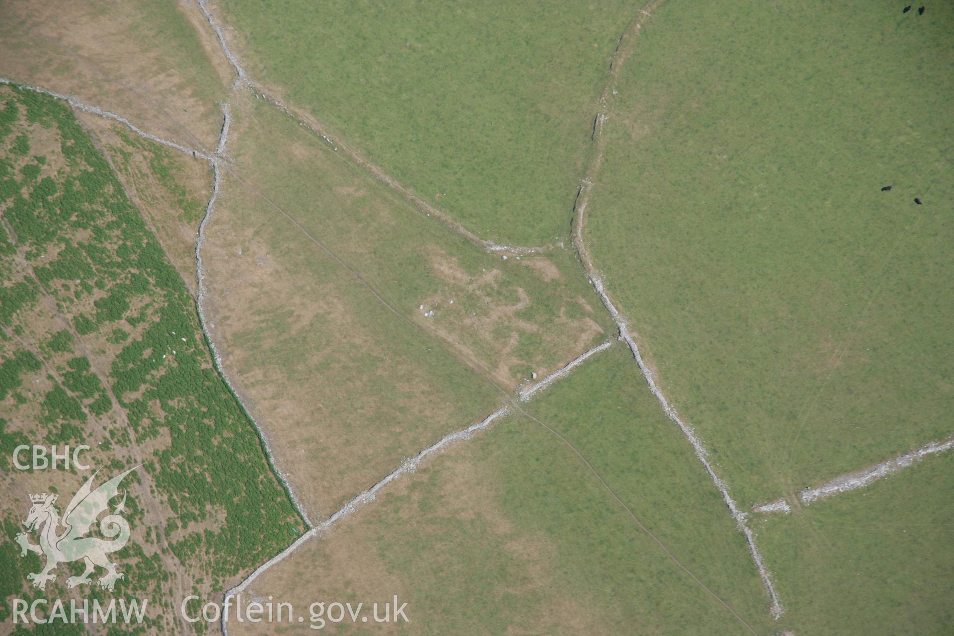 RCAHMW colour oblique aerial photograph of Ty-Gwyn Settlement Features. Taken on 25 July 2006 by Toby Driver