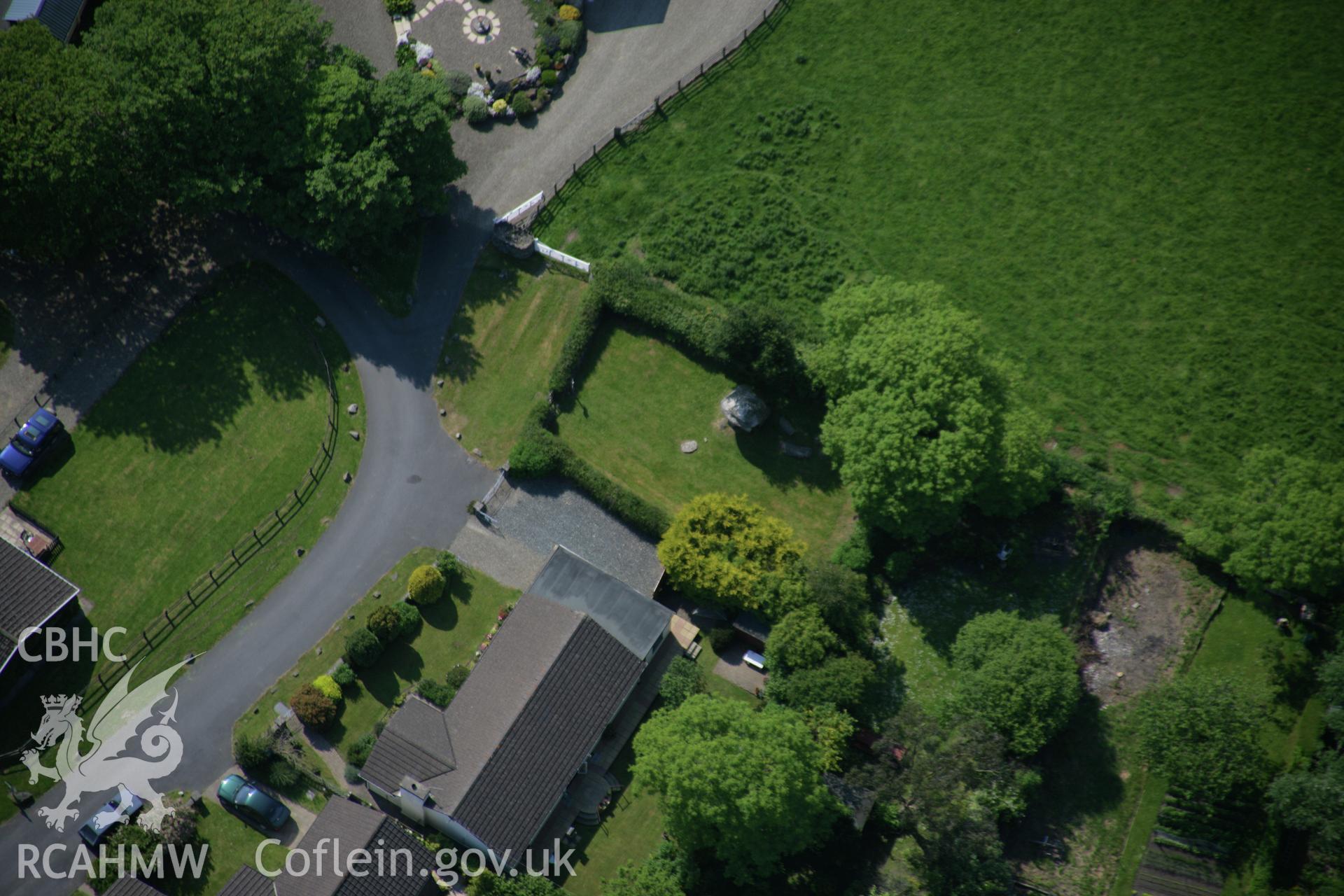 RCAHMW colour oblique aerial photograph of Carreg Coetan Arthur from the east. Taken on 08 June 2006 by Toby Driver.