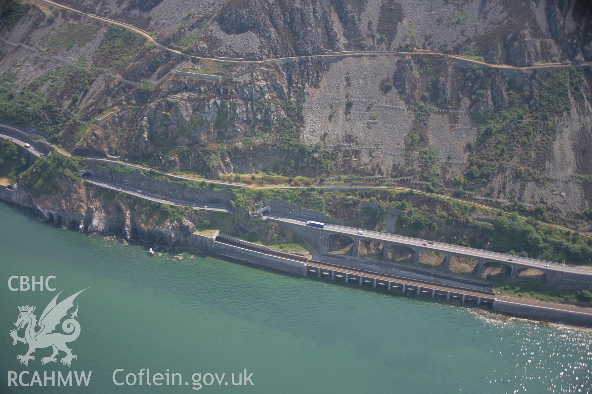 RCAHMW colour oblique aerial photograph of Pen-y-Clip Road Tunnel, Penmaenmawr. Taken on 25 July 2006 by Toby Driver.