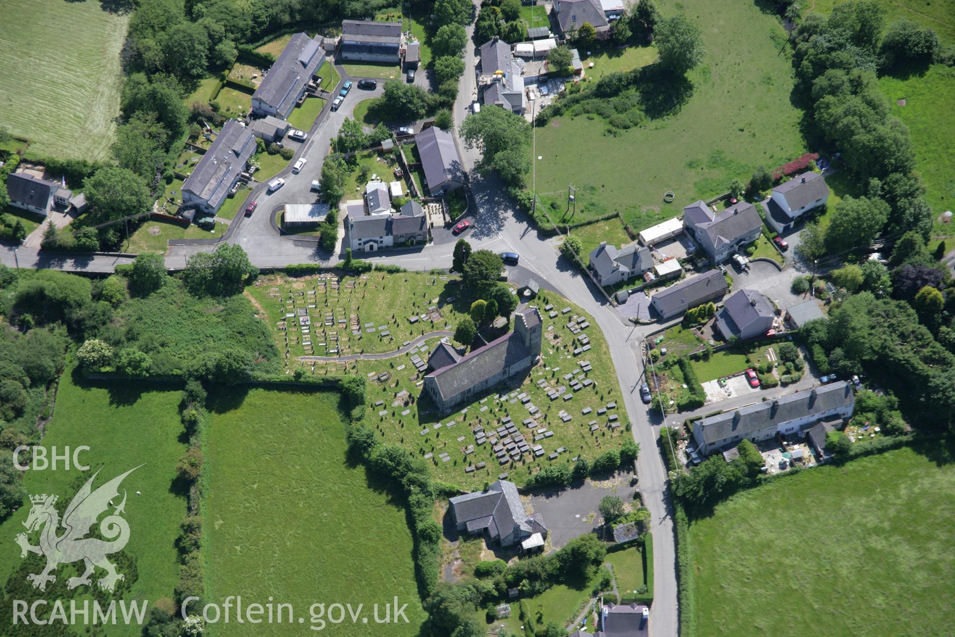 RCAHMW colour oblique aerial photograph of Holy Cross Church, Llannor, viewfrom the north. Taken on 14 June 2006 by Toby Driver.